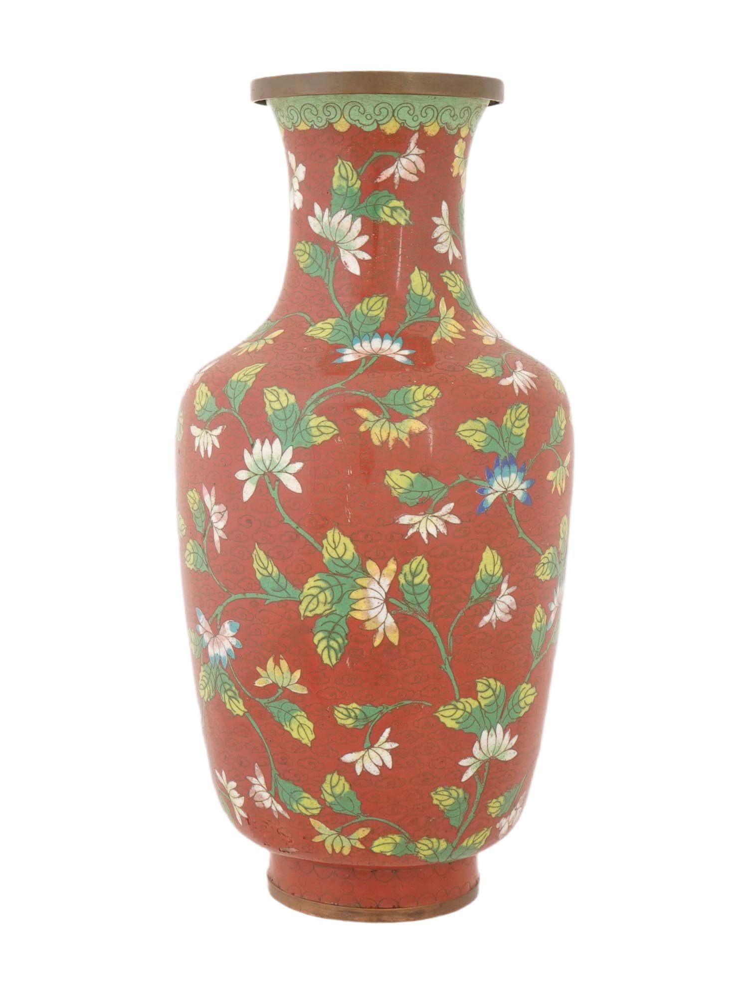 CHINESE FLORAL POLYCHROME CLOISONNE ENAMEL VASE: A Chinese enamel over brass vase. The vase has an urn shaped with a wide fluted neck. The exterior of the vase is adorned with polychrome enamel design representing floral and foliage ornaments made i