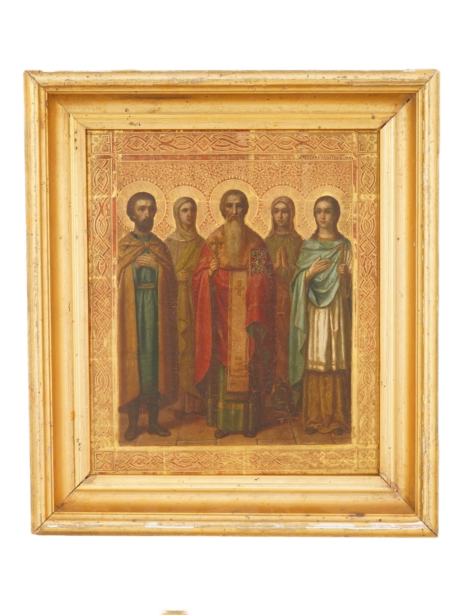 ANTIQUE RUSSIAN ORTHODOX ICON FIVE SELECTED SAINTS: An antique Russian Orthodox icon depicting five selected saints. Handcrafted in egg tempera and gesso on a wood panel with a gold-leaf ground, the icon shows five full-length standing saints arranged