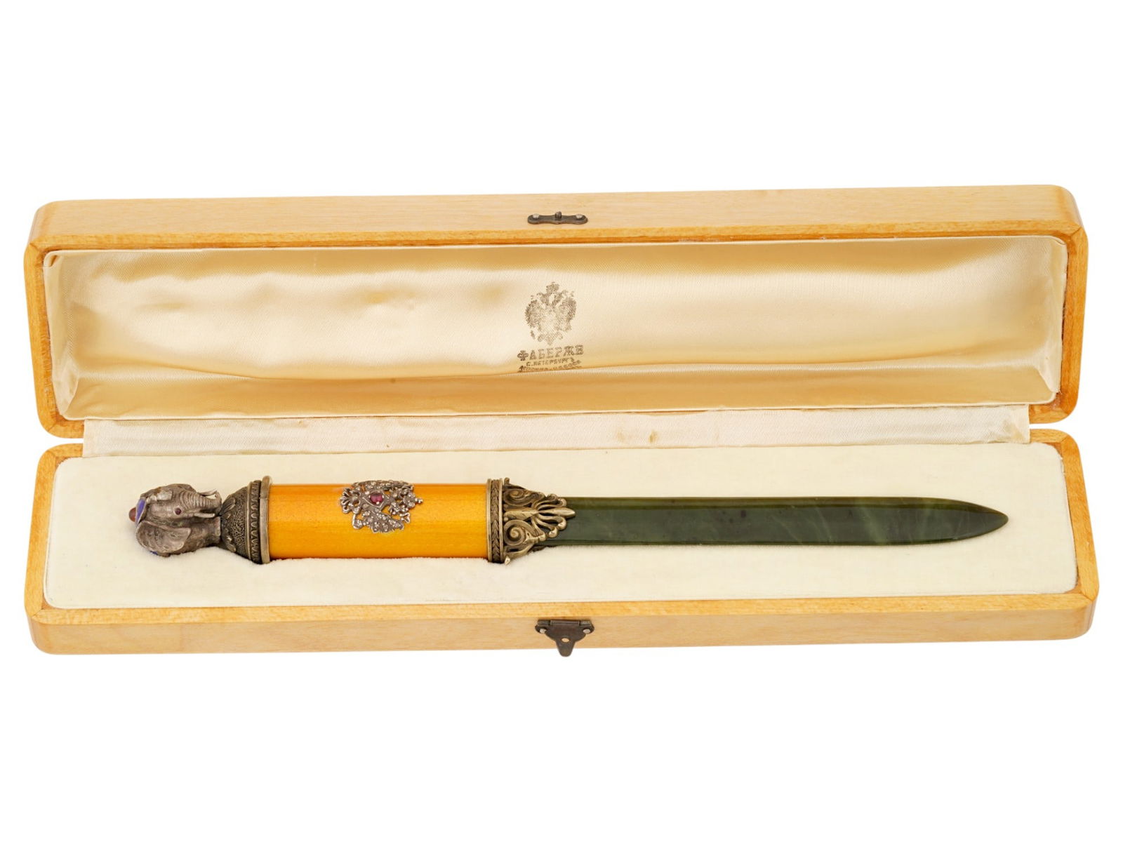 RUSSIAN SILVER JADE ENAMEL LETTER OPENER WITH GEMSTONES: A Russian silver letter opener with a carved nephrite jade blade. Features a yellow guilloche enameled handle decorated with gilt silver elements to the edges and ricasso, as well as a relief