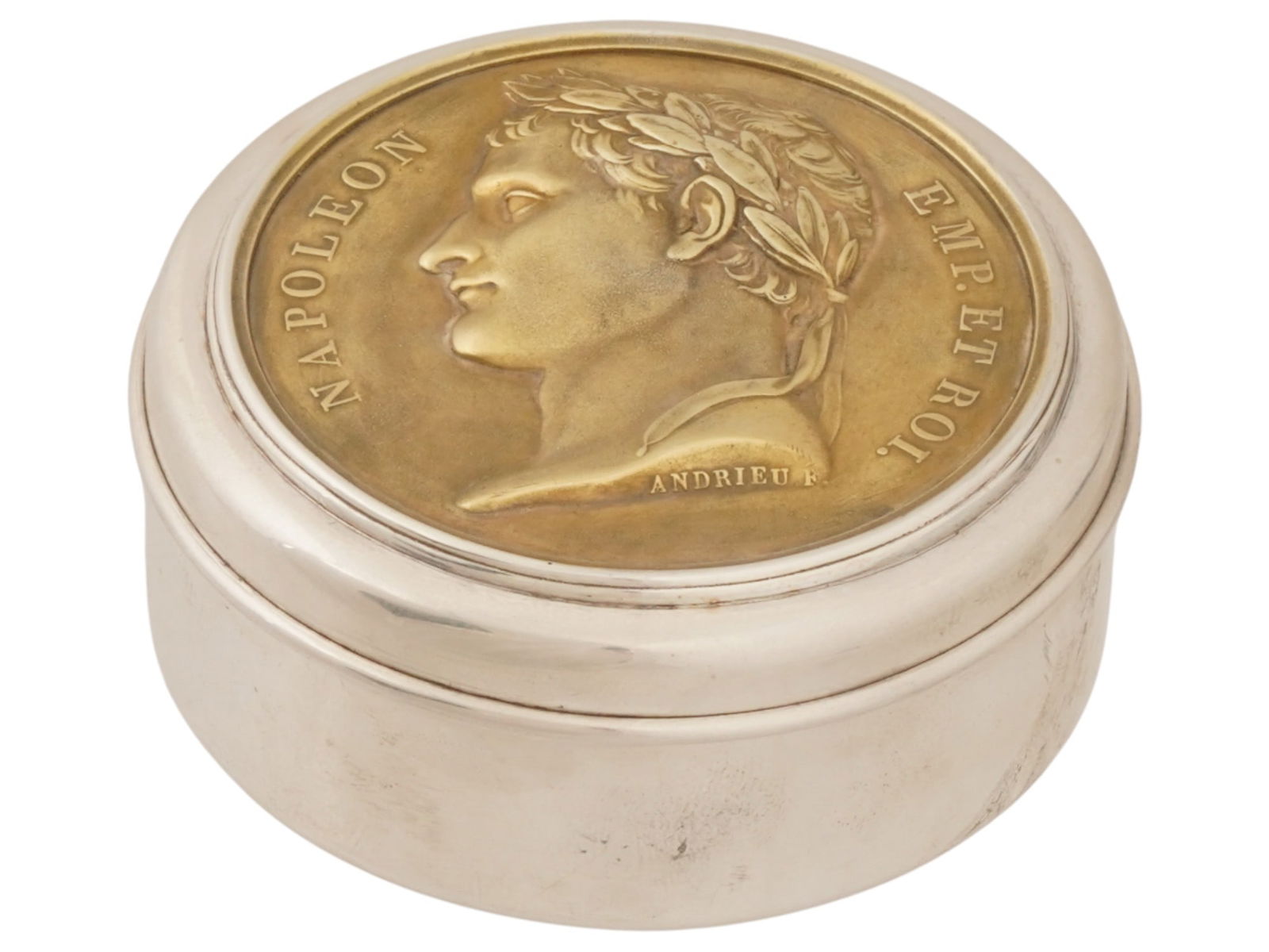 RUSSIAN SILVER ROUND BOX WITH NAPOLEON MEDALLION ON LID: A Russian 84 gilt silver Napoleon trinket box. Round shape, gold washed inside. The cover is repousse and chased with the medallion of the profile portrait of French Emperor Napoleon Bonaparte,