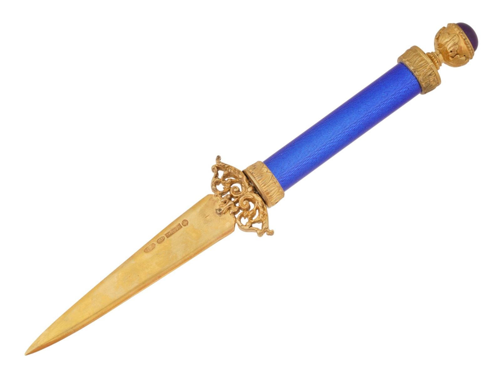 RUSSIAN SILVER ENAMEL LETTER OPENER WITH AMETHYST: A Russian letter opener with a gilt silver blade decorated with openwork floral decor on the ricasso. The handle is covered with blue enamel over a wavy guilloche ground. The top is set with a large