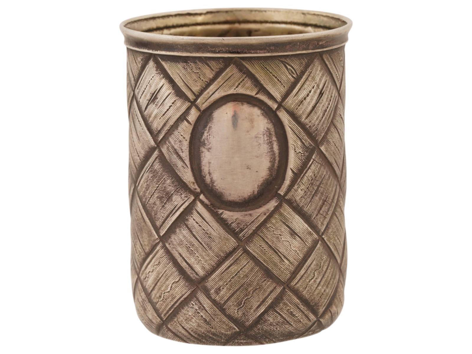 RUSSIAN 84 SILVER SHOT CUP W RELIEF WOVEN PATTERN: A Russian silver shot cup. It features a distinctive all-over relief pattern designed to mimic a woven basketweave texture. Featuring a smooth oval plaque is centrally to the body, likely intended