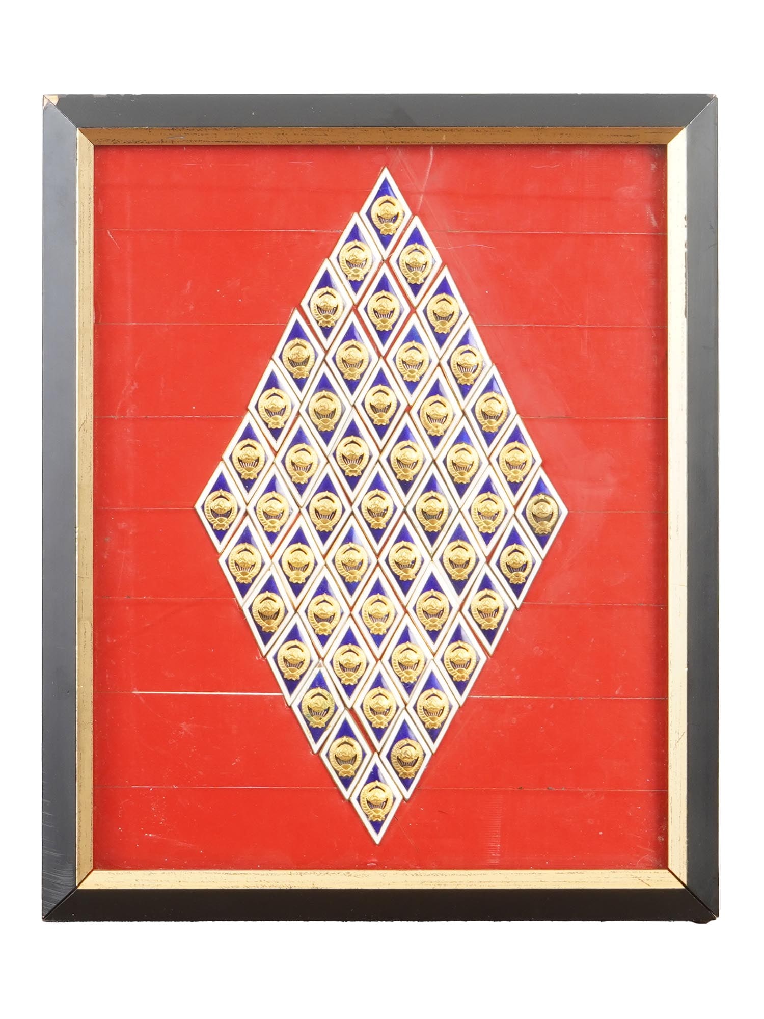 COLLECTION VINTAGE SOVIET UNIVERSITY GRADUATION BADGES: A collection of 49 vintage Soviet university graduation badges, each featuring the USSR coat of arms on a distinctive blue rhombus-shaped enamel background, with a screw back. The collection is arrang