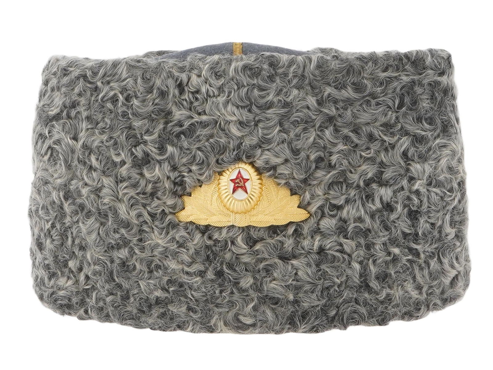 RUSSIAN SOVIET USSR ARMY GENERAL PAPAKHA HEADDRESS: A vintage Russian Soviet USSR army general Papakha headdress. Circa 1930s to 1991. The item is a high cylindrical hat made of genuine Karakul fur with a cloth bottom and top. On the front is attached
