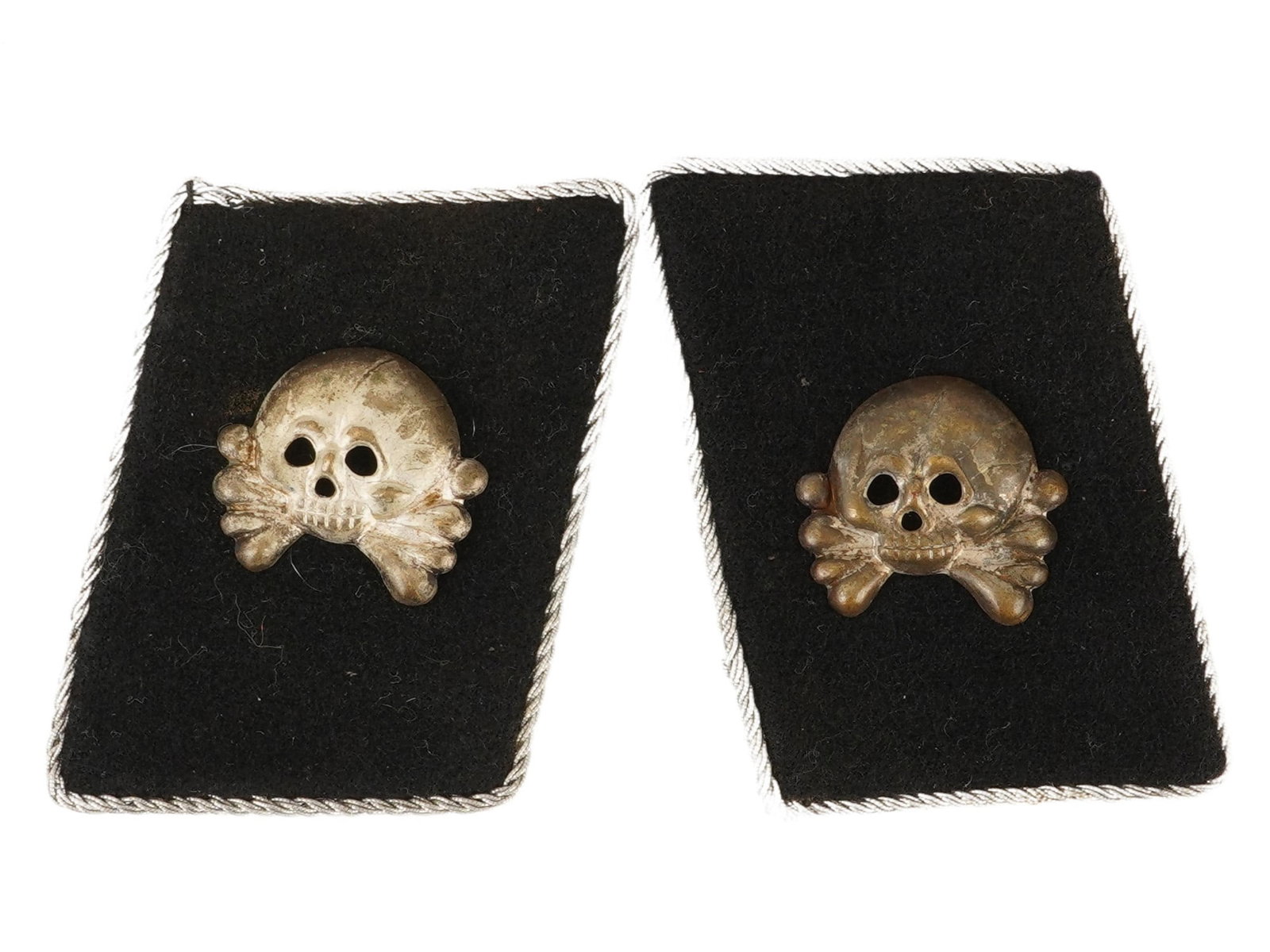 LOT OF WWII NAZI GERMAN WAFFEN SS PANZER COLLAR TABS: A pair of World War II Nazi German Waffen SS Panzer collar tabs. Black wool with a zinc Totenkopf skull overlay and silver piping. Second World War Historical Collectables And Memorabilia, Waffen SS M