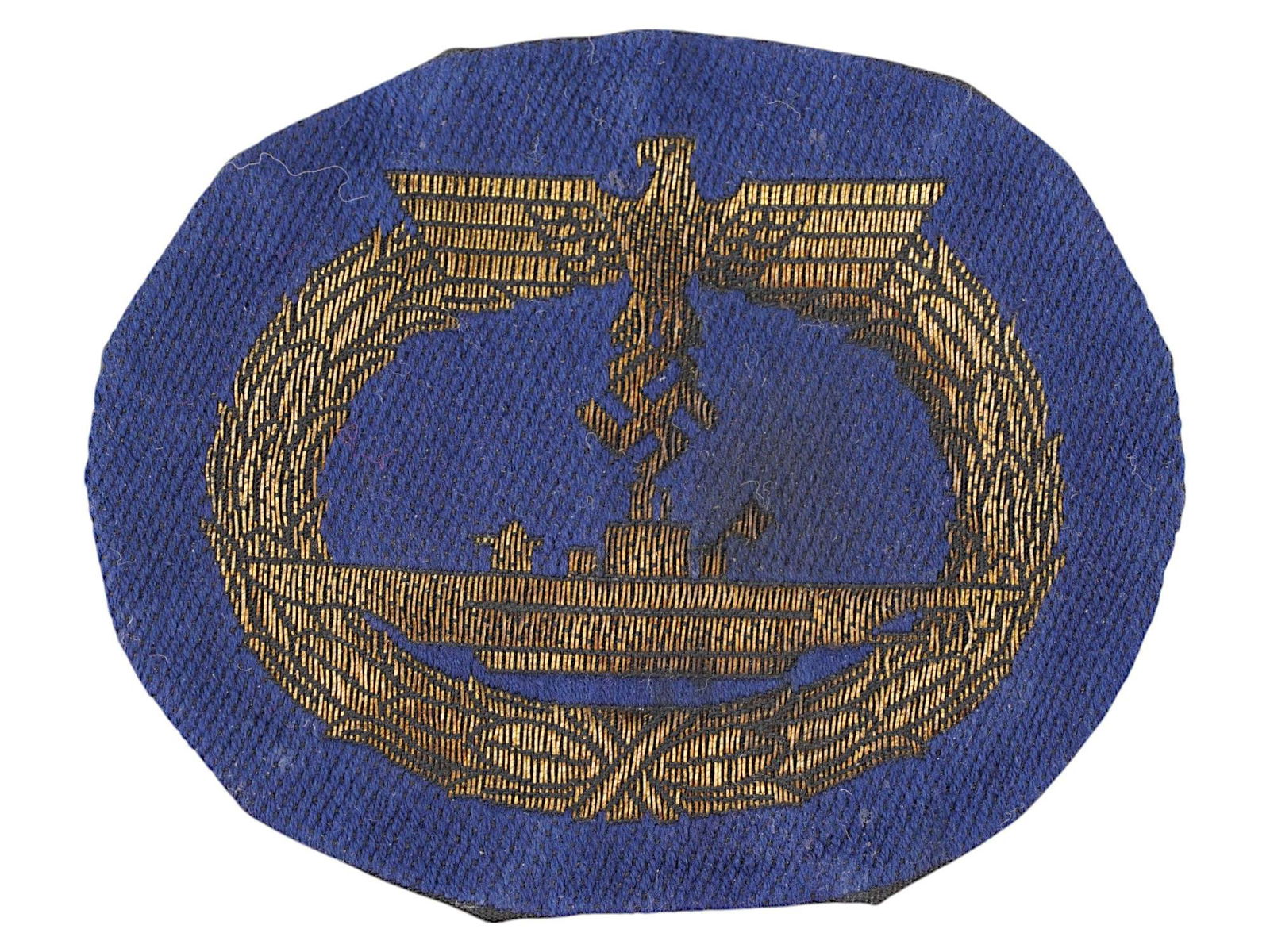 WWII NAZI GERMAN KRIEGSMARINE U BOAT OFFICER PATCH: A WWII Nazi German Kriegsmarine U-Boat officer patch, gold bullion wire embroidery on dark backing, featuring a submarine at center beneath a German eagle clutching a swastika, all within an oak leaf