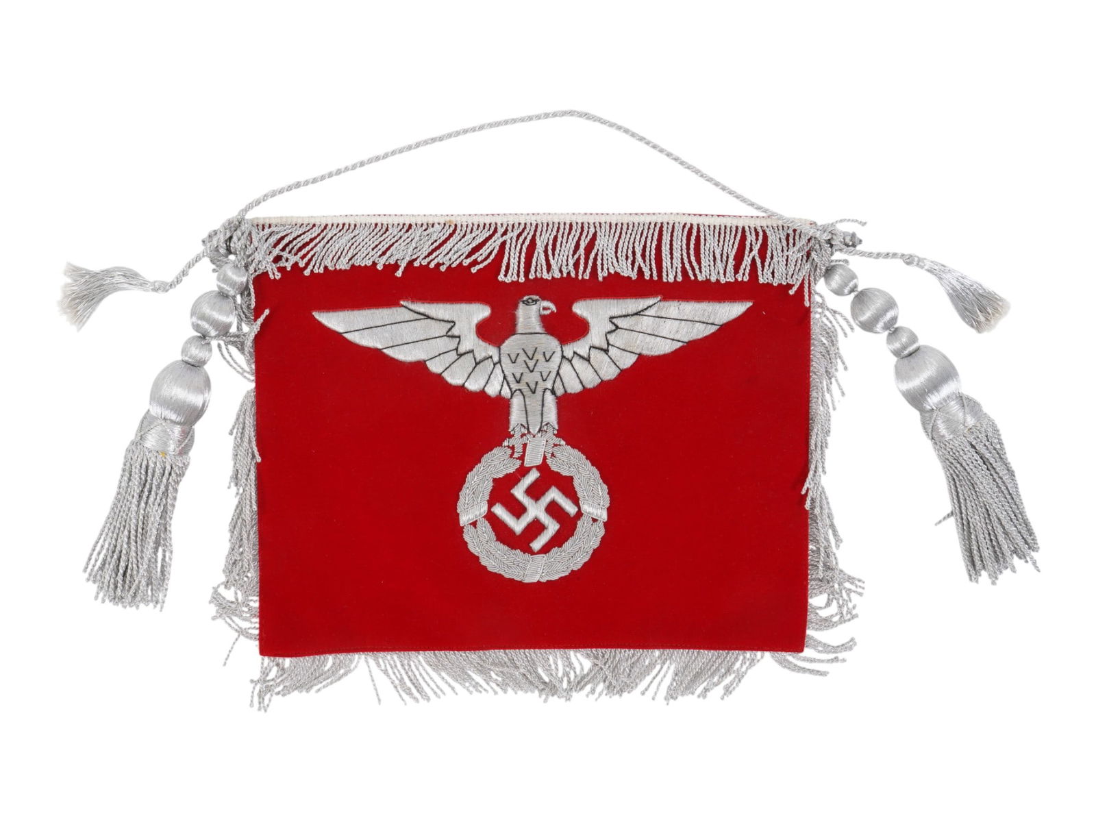 WWII TYPE NAZI GERMAN STANDARD OR PARADE BANNER: A WWII type Nazi German standard or parade banner, likely trumped banner. The piece features a red field made of velvet with a large, intricately embroidered silver thread Nazi eagle clutching a wreat