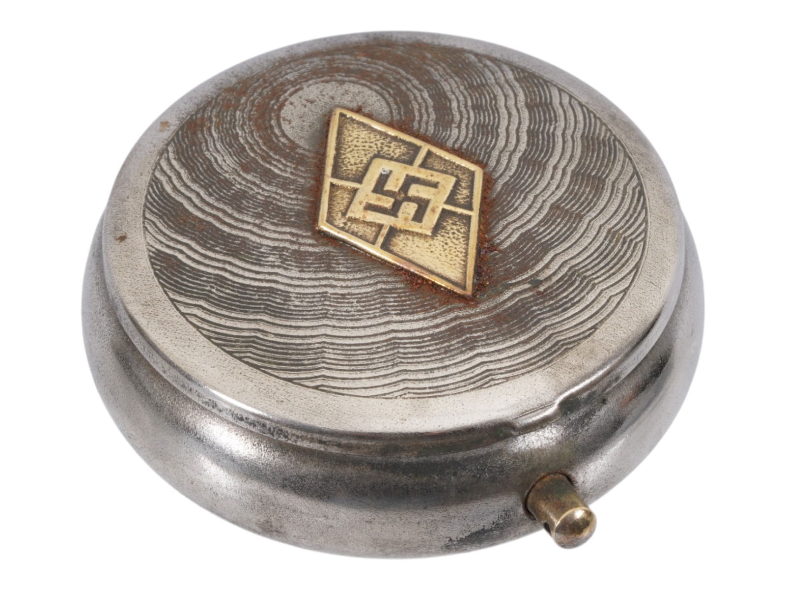GERMAN WWII TYPE HITLER YOUTH POCKET ASHTRAY: A World War II type Nazi German stainless steel pocket ashtray with hinged lid. The lid is decorated with an embossed gold tone Hitlerjugend Hitler Youth logo. Marked on the back side, RZM. Second Wor