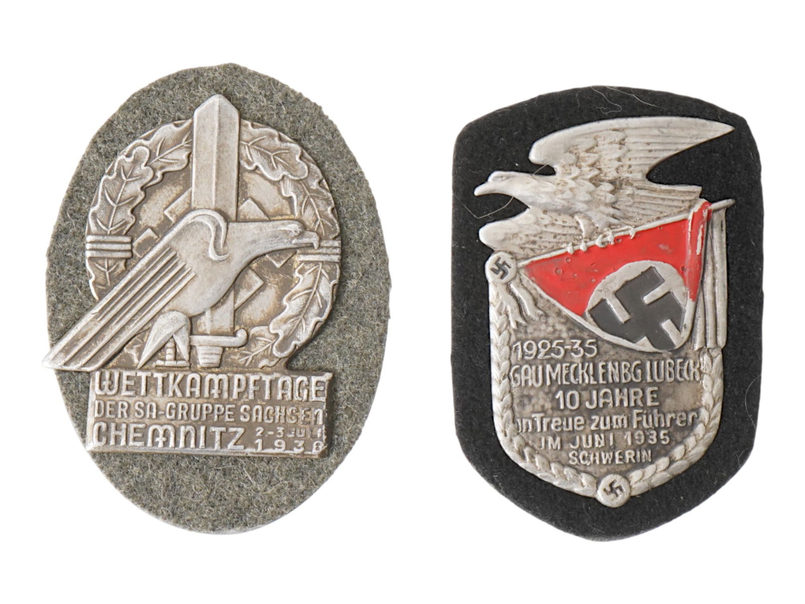GROUP OF GERMAN WWII MODEL 1938 SA 1935 GAU SHIELDS: A group of two Nazi German WWII model shields. The lot includes a 1938 SA Gruppe Sachsen Chemnitz Championship and 1935 GAU Mecklenburg Lubeck 10 Years shield. World War II Historical Collectables And