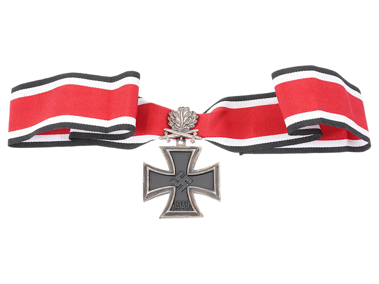 WWII MODEL GERMAN KNIGHTS CROSS OF THE IRON CROSS: A model of the Knights Cross of the Iron Cross, or Ritterkreuz, the highest award in the military forces of Nazi Germany instituted in September 1939. Cast iron cross of patte shape with embossed swas