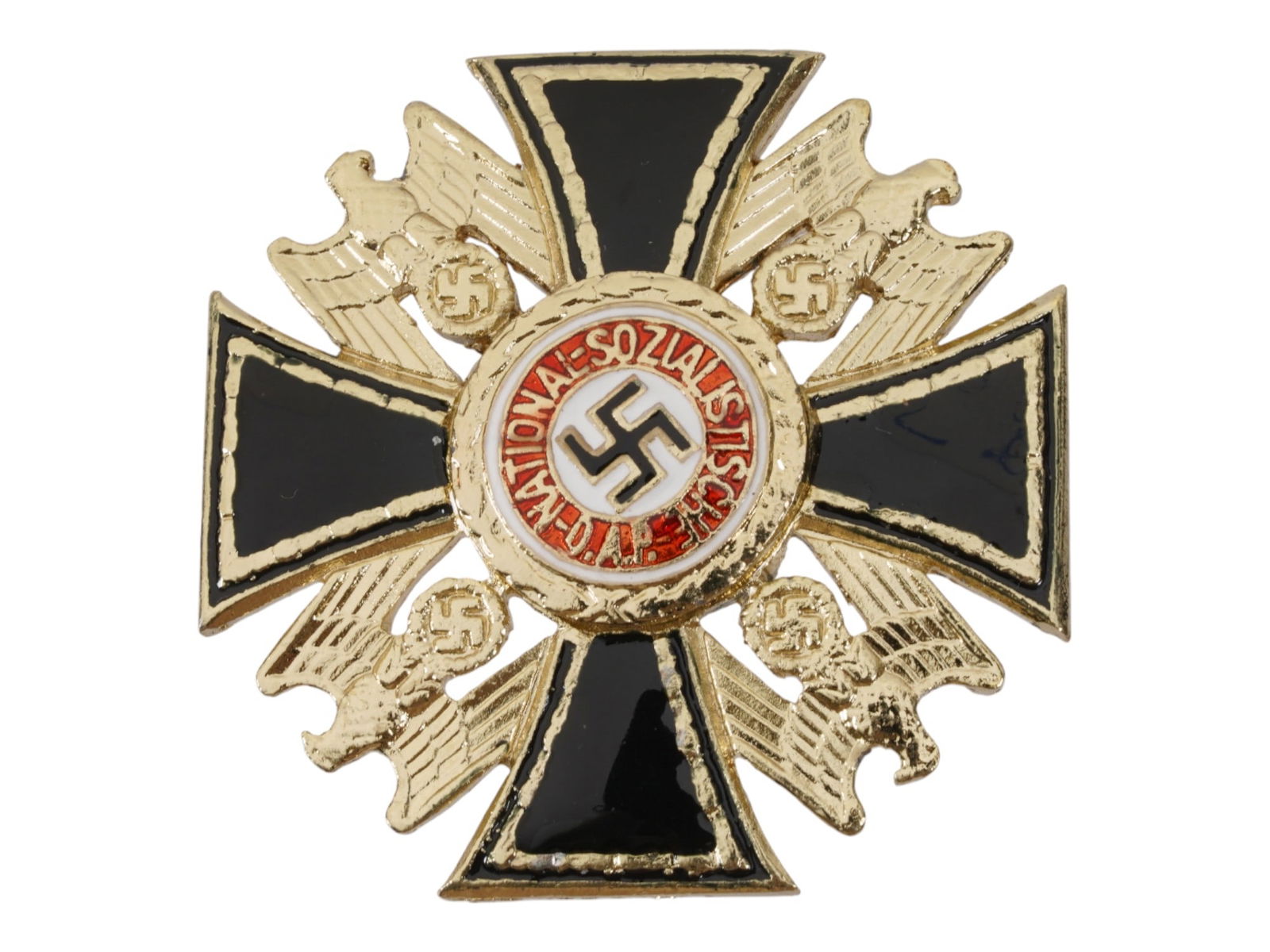 WWII NAZI THIRD REICH GERMAN ORDER PIN BADGE: A WWII Nazi Third Reich German Order pin badge with a black enamel cross and a medallion featuring the Golden Party Badge in the center. In between the arms of the cross there are national eagles with
