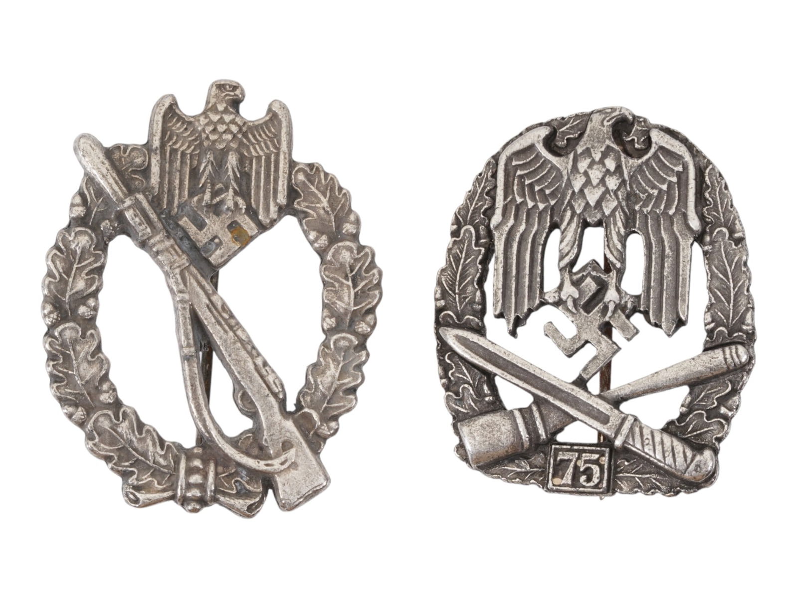 GROUP OF TWO WWII NAZI GERMAN ARMY COMBAT BADGES: A group of two WWII Nazi German Army combat badges, consisting of a General Assault Badge with 75 assaults and an Infantry Assault Badge. The General Assault Badge displays an oval oak-leaf wreath sur