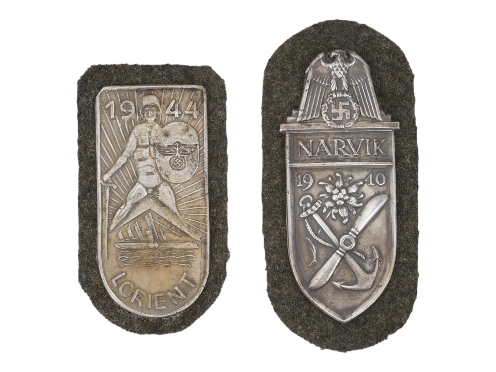 GROUP OF TWO WWII MODEL GERMAN SHIELDS: A pair of World War II type Nazi German military decorations. Narvik Shield. L Orient Shield. Second World War Historical Collectibles And Memorabilia, Military Uniform Accessories, Insignia, Pins And