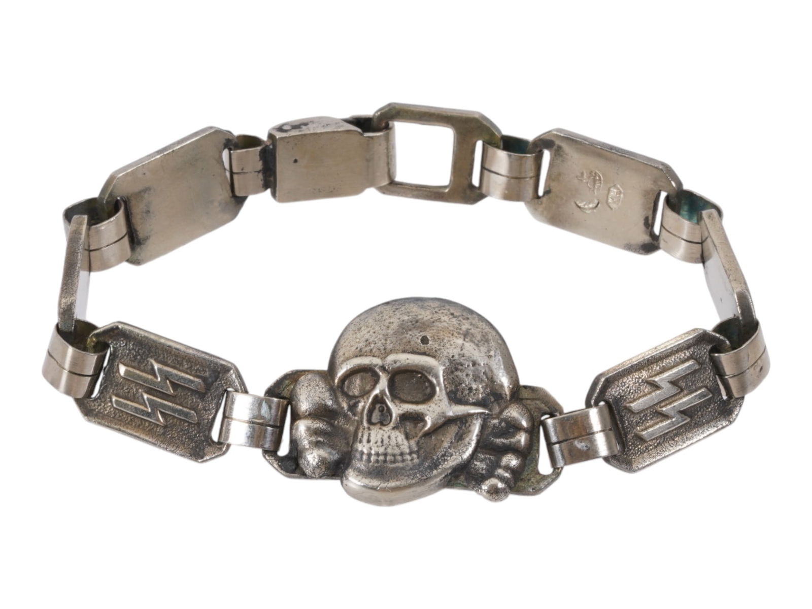 WWII TYPE GERMAN WAFFEN SS TOTENKOPF BRACELET: A World War II type Nazi German Waffen SS silver link bracelet. The links are decorated with relief SS runes and skulls. The central figural link represents the Totenkopf. German silver crescent and c