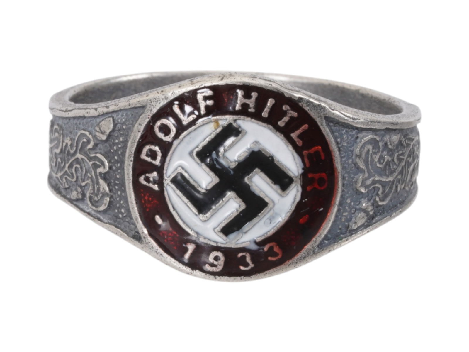 GERMAN WWII MODEL NSDAP ADOLF HITLER SILVER RING: A WWII type Nazi German Third Reich Adolf Hitler 1933 elections Silver ring. The exterior of the ring is engraved with oak leaves and covered with black, red and white enamel with a swastika insignia
