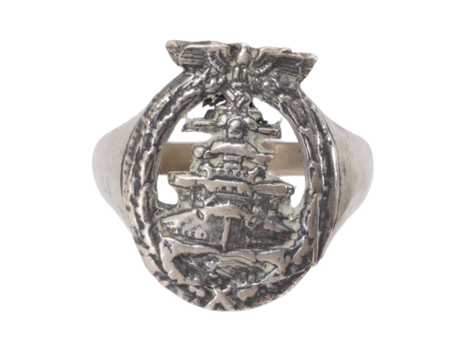 GERMAN WWII TYPE KRIEGSMARINE CAPTAINS SILVER RING: A WWII type Nazi German Third Reich Kriegsmarine High Seas Fleet Captains silver ring. Thye ring is adorned with an engraved ship design in an oak wreath and a Nazi eagle clutching a swastika insignia