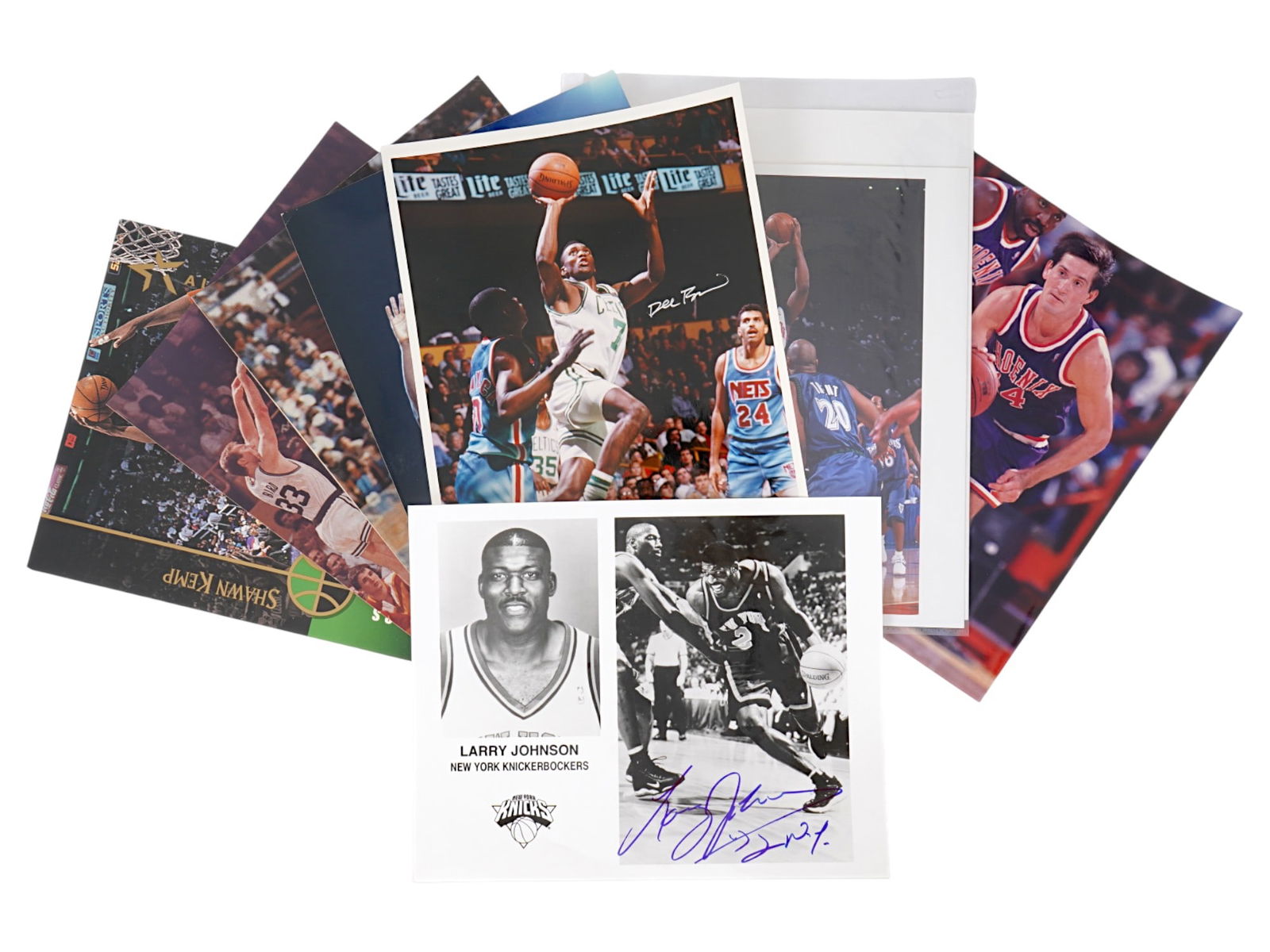 LOT OF 8 AUTOGRAPHED PHOTOGRAPHS AND PRINTS: A diverse 8-piece lot of autographed items featuring a mix of sports and entertainment figures. This variety pack is ideal for resellers or collectors looking for a broad spectrum of autographs. Multi