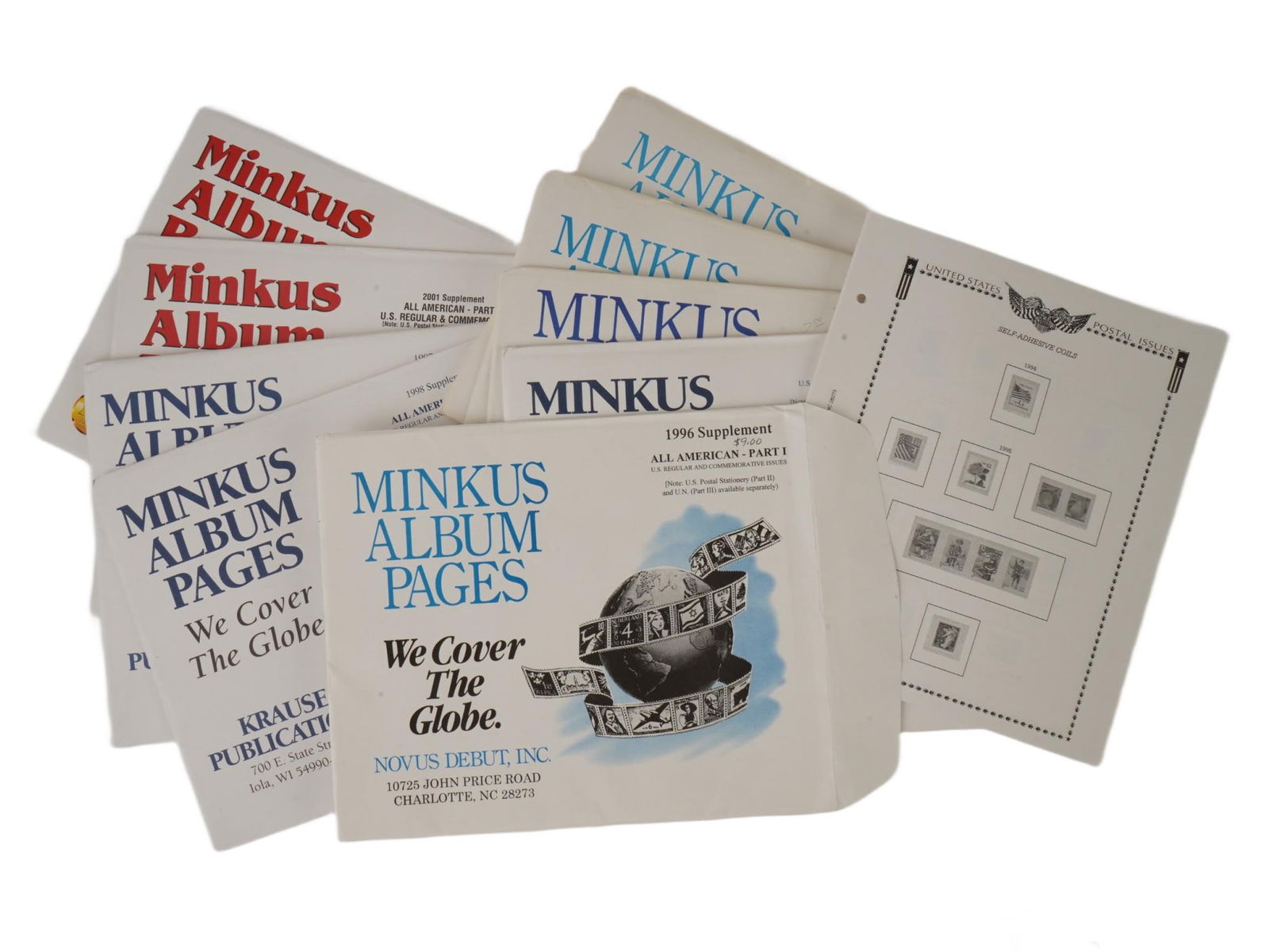 VINTAGE MINKUS STAMP ALBUM SUPPLEMENTS AND PAGES: A group of vintage assorted Minkus stamp album supplements and pages for stamp collecting. Minkus, a longtime competitor to the Scott catalogue, was known for publishing comprehensive stamp albums and