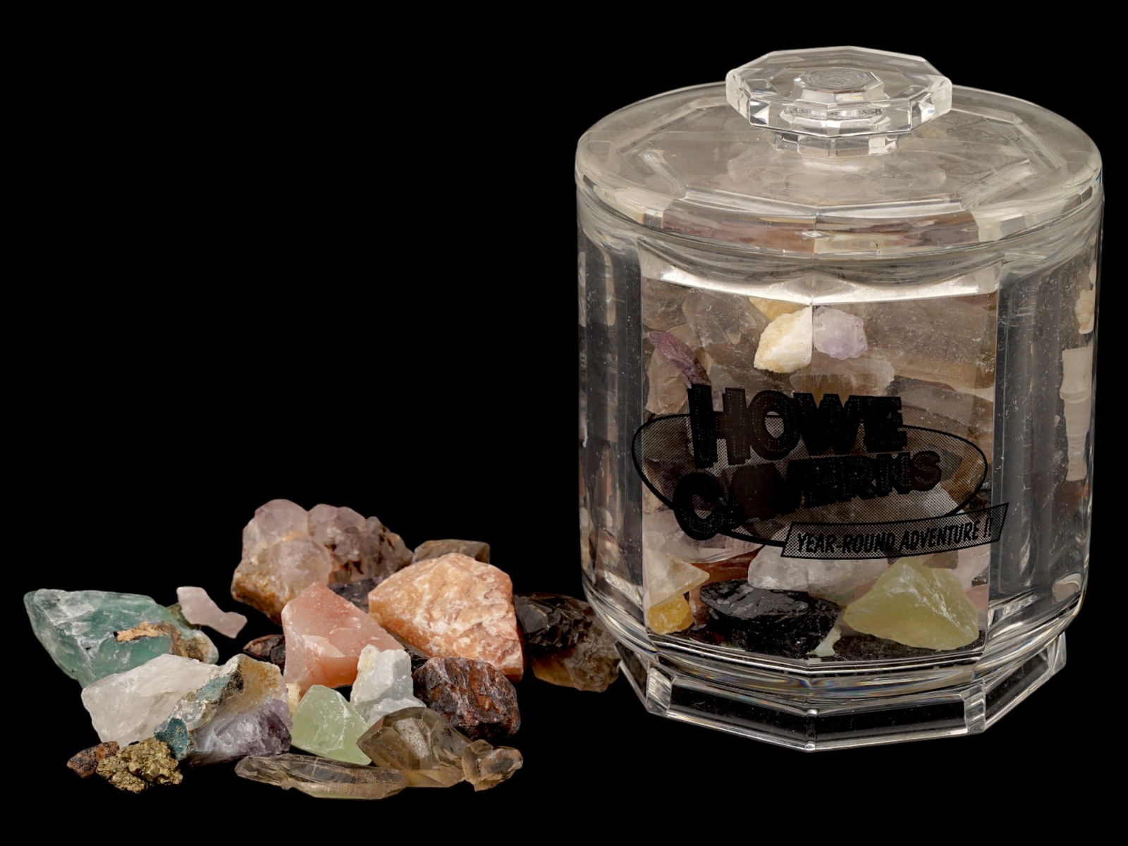 LARGE COLLECTION OF ASSORTED ROUGH CRYSTALS IN BOX: A large collection of assorted rough crystals. The crystals are presented in various sizes and shades. Presented in a covered glass box. Crystals and Mineral Specimens, Decorative Objects, and Collect