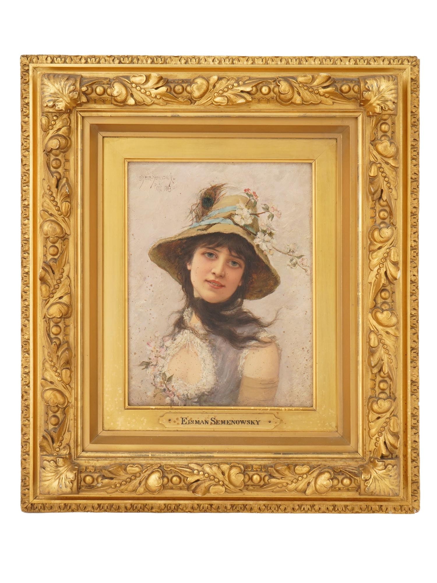 EMILE EISMAN SEMENOWSKY FEMALE PORTRAIT PAINTING: Emile Eisman-Semenowsky, 1857 to 1911, an oil female portrait painting on wooden board titled Girl with Hat. Signed upper left and dated 1883. Additionally signed on the label. Eisman-Semenowsky was a