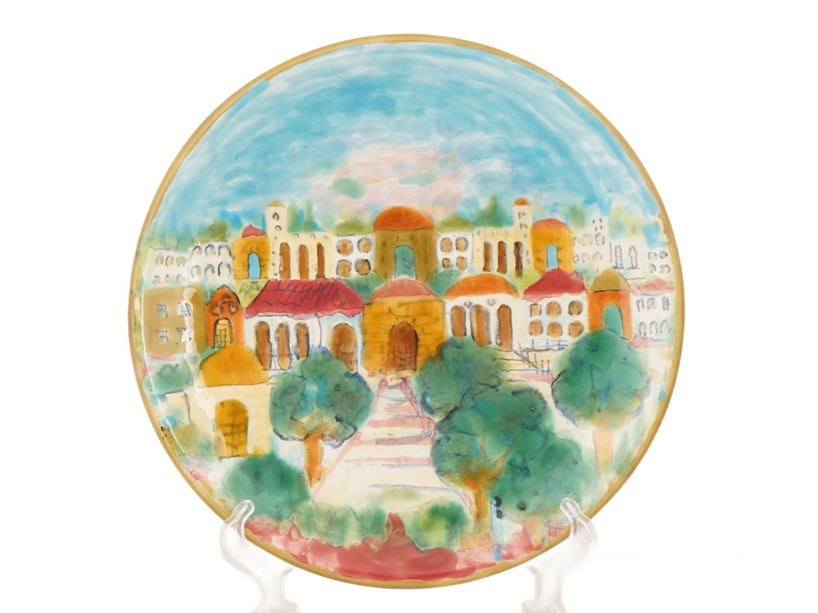 VTG ISRAELI MAGAL EIN HOD DECORATIVE PLATE JERUSALEM: A vintage Israeli hand-painted decorative plate created in Ein Hod, depicting a vibrant, stylized Middle Eastern cityscape characteristic of Jerusalem. The plate features a folk-art style with colorfu