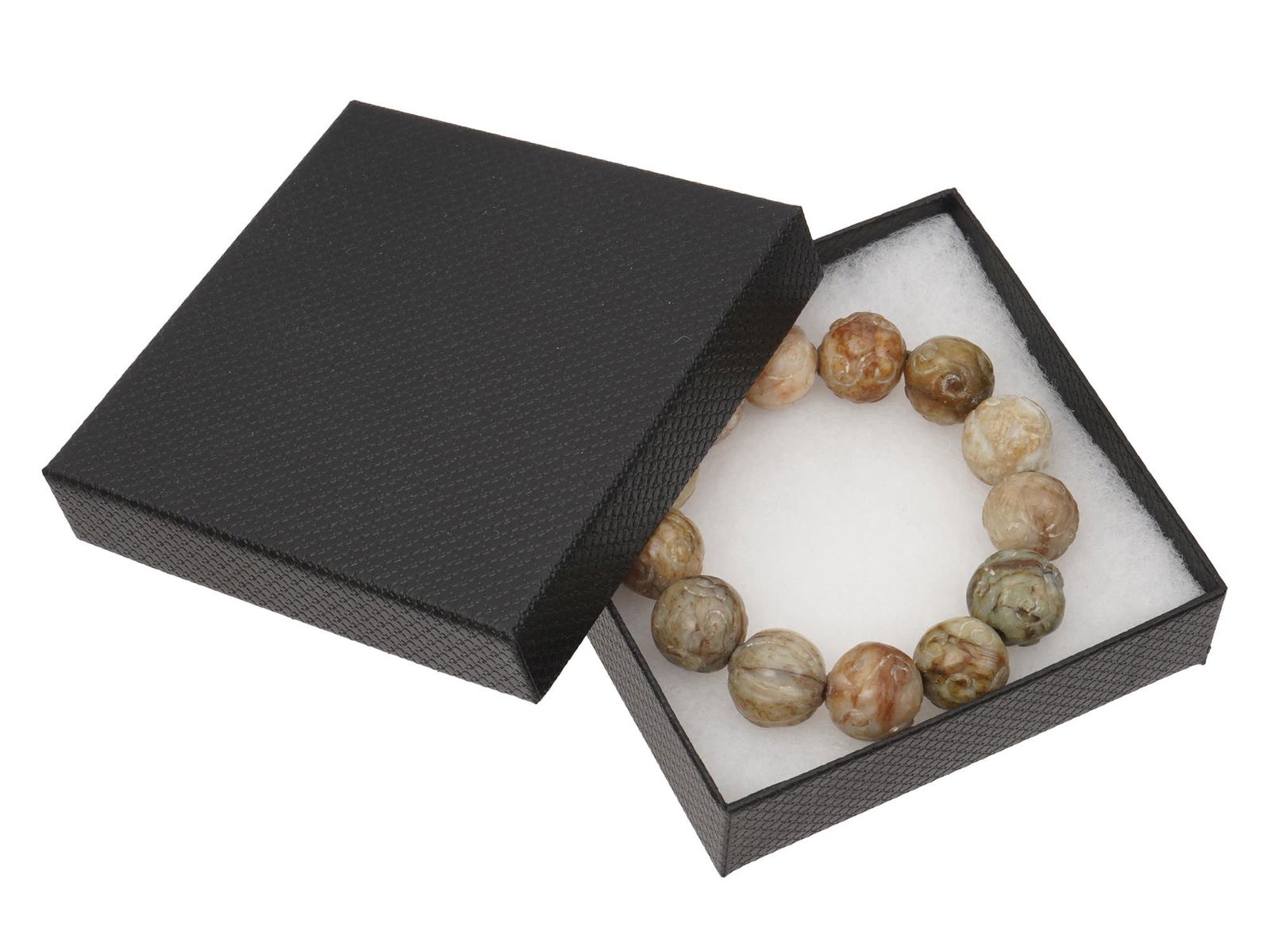 CHINESE CARVED NATURAL HETIAN WHITE JADE BEAD BRACELET: A Chinese hand carved natural Hetian white jade beaded bracelet. Each bead is carved depicting an abstract pattern. Presumably antique. Comes in box. Oriental Asian Jewelry For Collectors. Weight 70 g