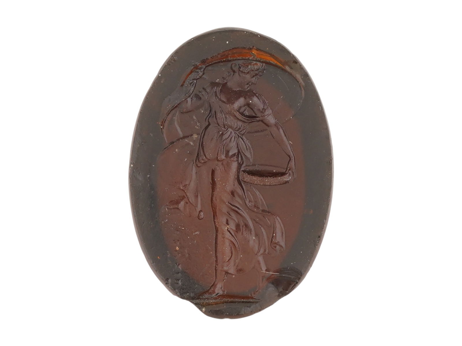 ROMAN MANNER OVAL FORM GODDESS HAND CARVED INTAGLIO: An oval shaped hand carved stone or glass intaglio made in the ancient Roman manner. The intaglio depicts probably Aequitas, the Roman personification of justice, rather than the more famous Themis or