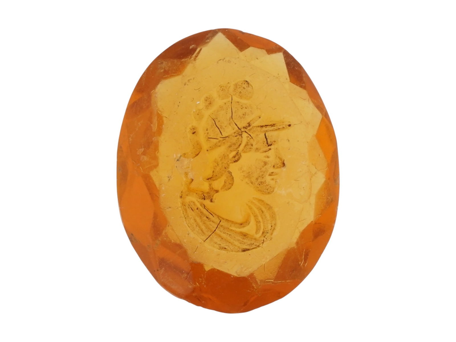 ANTIQUE CARVED INTAGLIO MALE PROFILE WITH HELMET: An antique carved intaglio featuring a male profile with elaborately styled helmet, drawing on classical Greco-Roman revival imagery. Antique Carvings And Jewelry Collectibles. THIS LOT IS ELIG