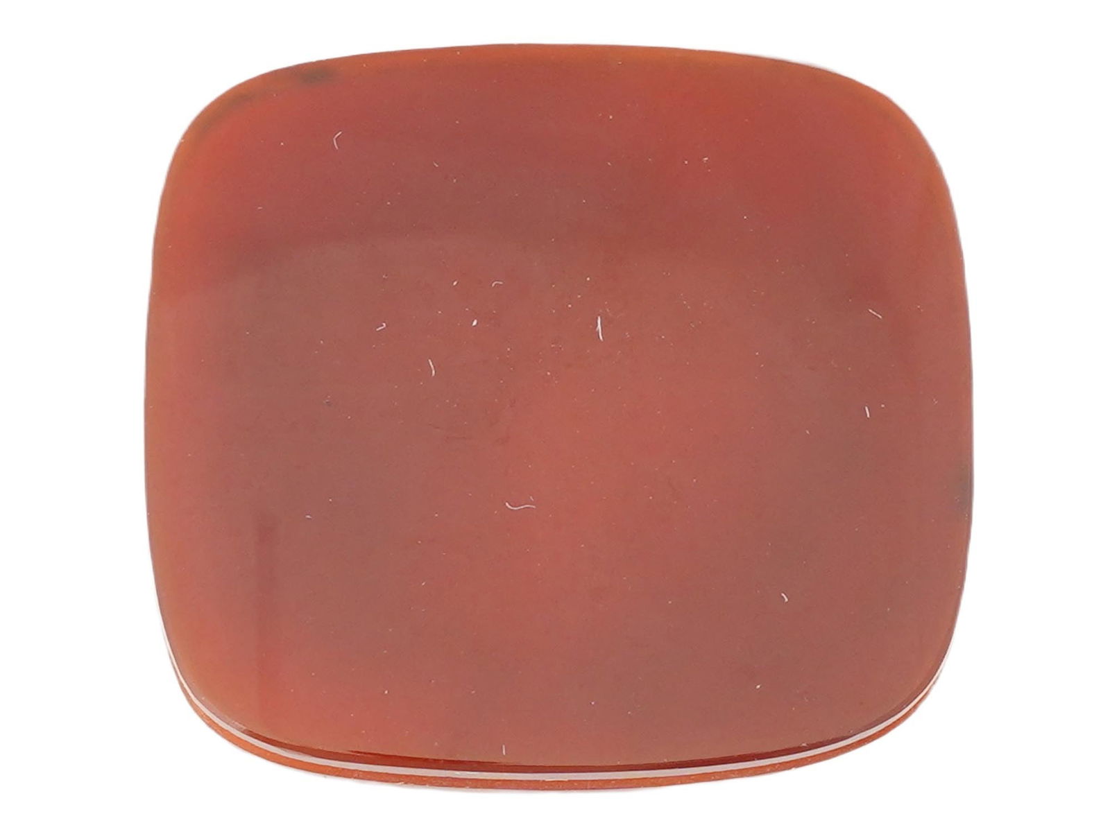 CARVED CARNELIAN INTAGLIO DOUBLE PROFILE PORTRAIT: A carnelian intaglio featuring a double profile portrait of a man and a woman, a classical motif popular in ancient Rome and later revived in the Victorian and Edwardian periods. Carved from carnelian