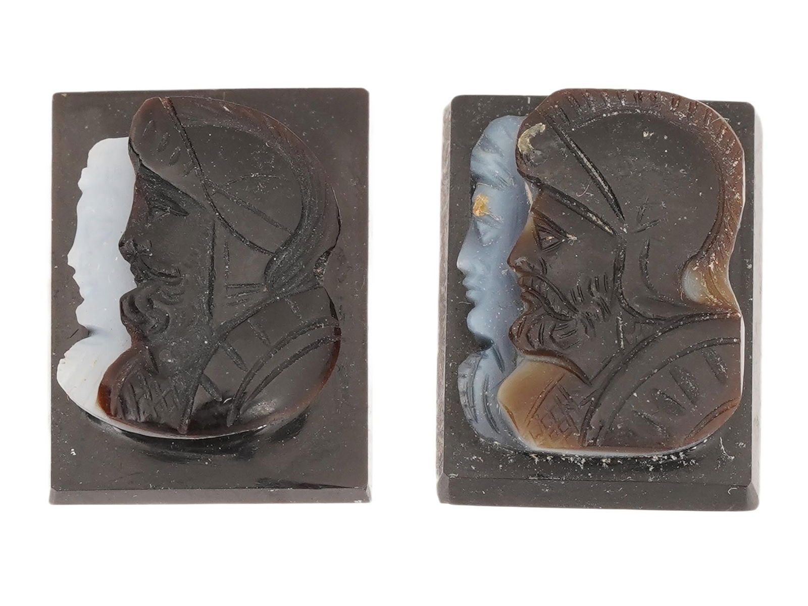 PAIR OF VINTAGE HAND CARVED ONYX CAMEOS: A pair of vintage hand-carved onyx cameos of rectangular shape. Double profile portrait of Roman soldiers. Collectible Gemstone Carvings, Sculpture, Glyptic Art, Jewelry. THIS LOT IS ELIGIBLE F
