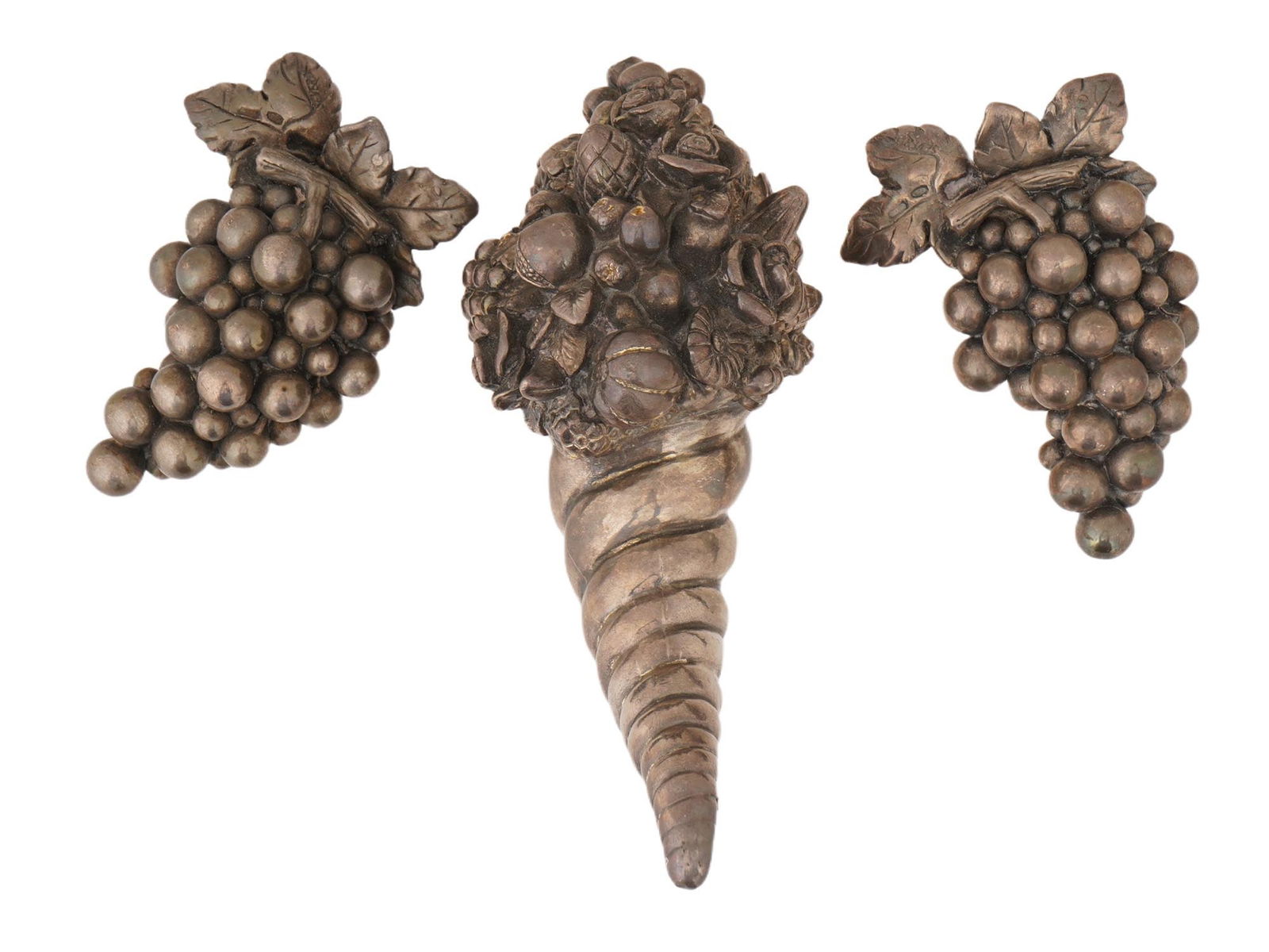 ANTIQUE STERLING SILVER DECORATIVE TABLE ORNAMENTS: A group of antique sterling silver decorative table ornaments, designed in the form of a cornucopia and grape clusters. The central element depicts a traditional horn of plenty overflowing with fruit