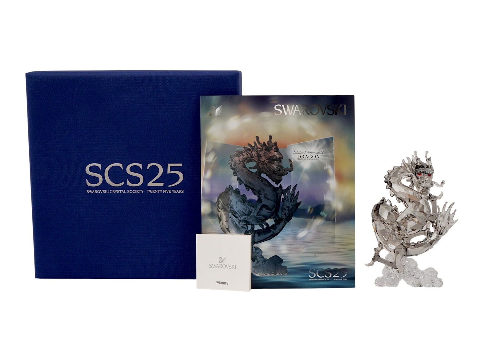 SWAROVSKI CRYSTAL SCS JUBILEE EDITION 2012 DRAGON FIGURE: A Swarovski Crystal SCS Jubilee Edition 2012 Dragon figurine. This limited edition was released to celebrate the 25th anniversary of the Swarovski Crystal Society SCS and the Chinese Year of the Drago