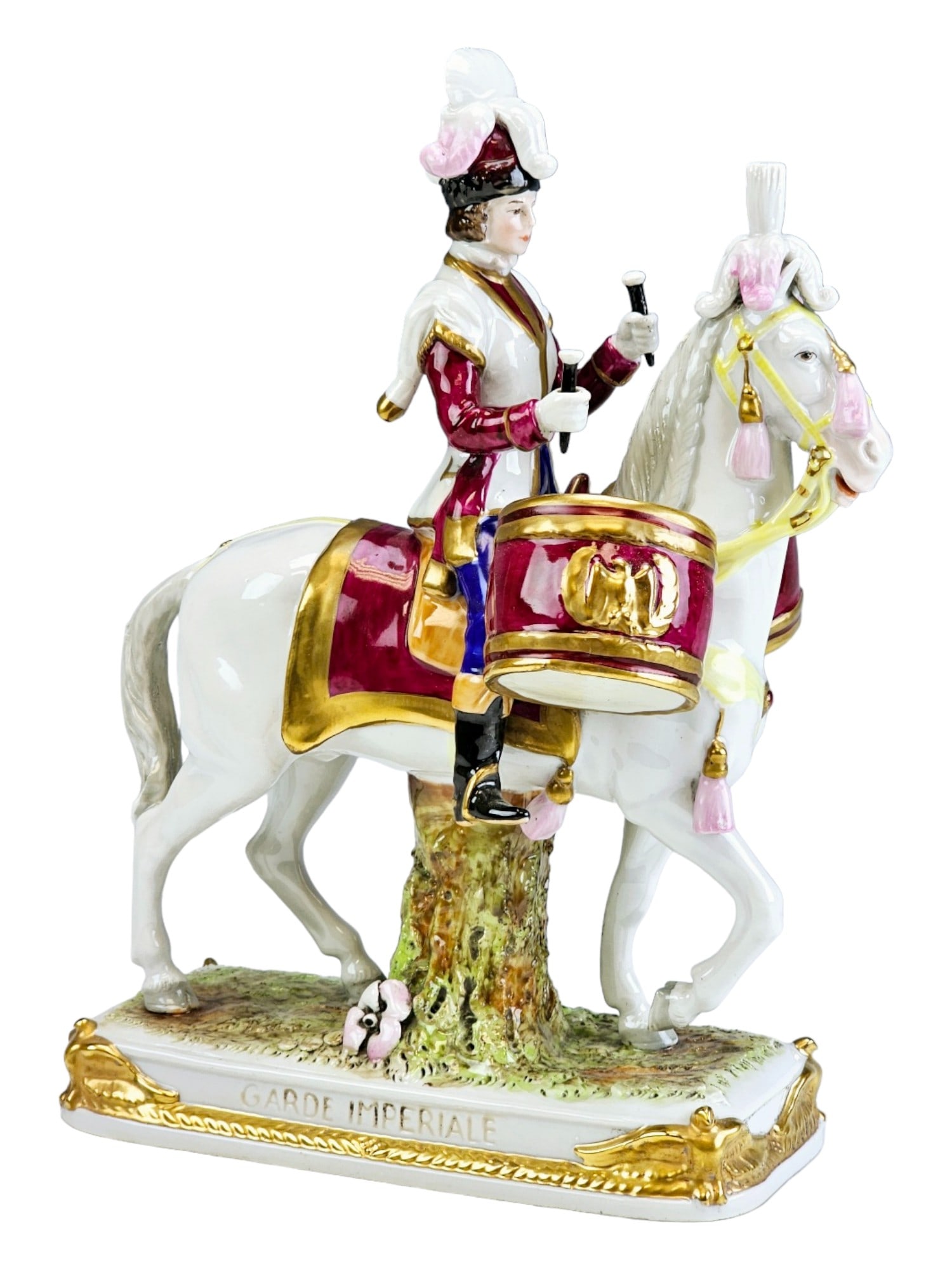 VINTAGE GERMAN SCHEIBE ALSBACH PORCELAIN FIGURINE: A vintage German large porcelain figurine by the Scheibe Alsbach factory. Featuring a polychrome hand painted figure of a Garde Imperial on horse with drums decorated with gilt accents. Marked with a