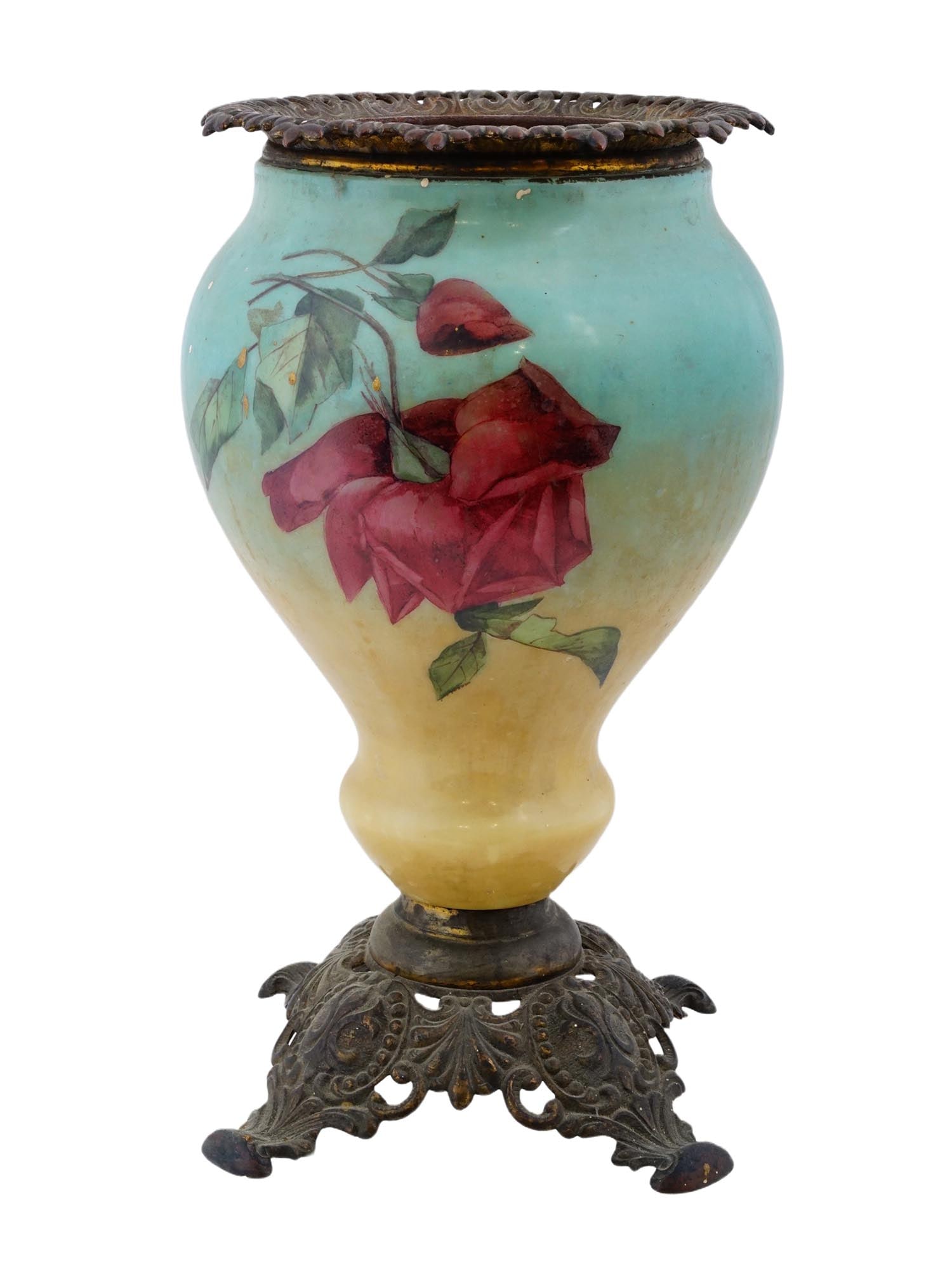 ANTIQUE VICTORIAN CERAMIC BRASS CACHEPOT BOWL: An antique Victorian hand painted ceramic cachepot bowl of baluster shape in brass fittings featuring four figured feet. The bowl is hand painted throughout the body, depicting a large red rose flower