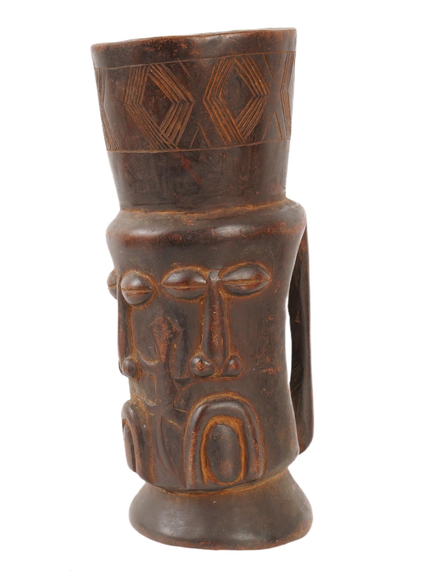 AFRICAN HAND CARVED WOODEN KUBA CEREMONIAL CUP: An African hand carved wooden Kuba ceremonial cup used for drinking palm wine, originating from the Kuba Kingdom in the Democratic Republic of the Congo. Elaborately carved cups like this one were com