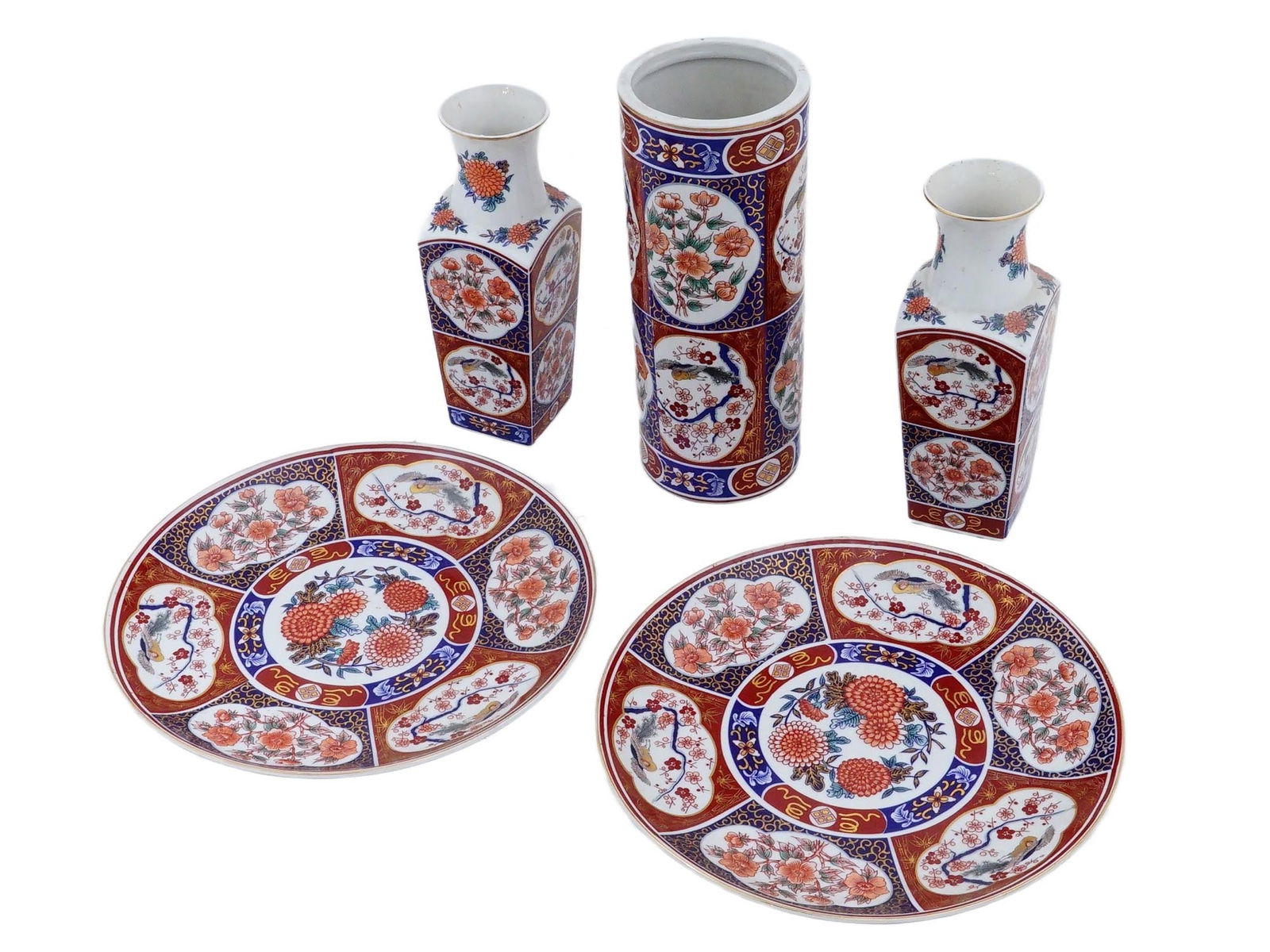VINTAGE JAPANESE IMARI STYLE PORCELAIN SET OF 5 PIECES: This five-piece Japanese porcelain set is decorated in a classic Imari palette of iron-red, cobalt blue, and gold gilt accents. The assembly includes two circular plates, two square-form baluster vase