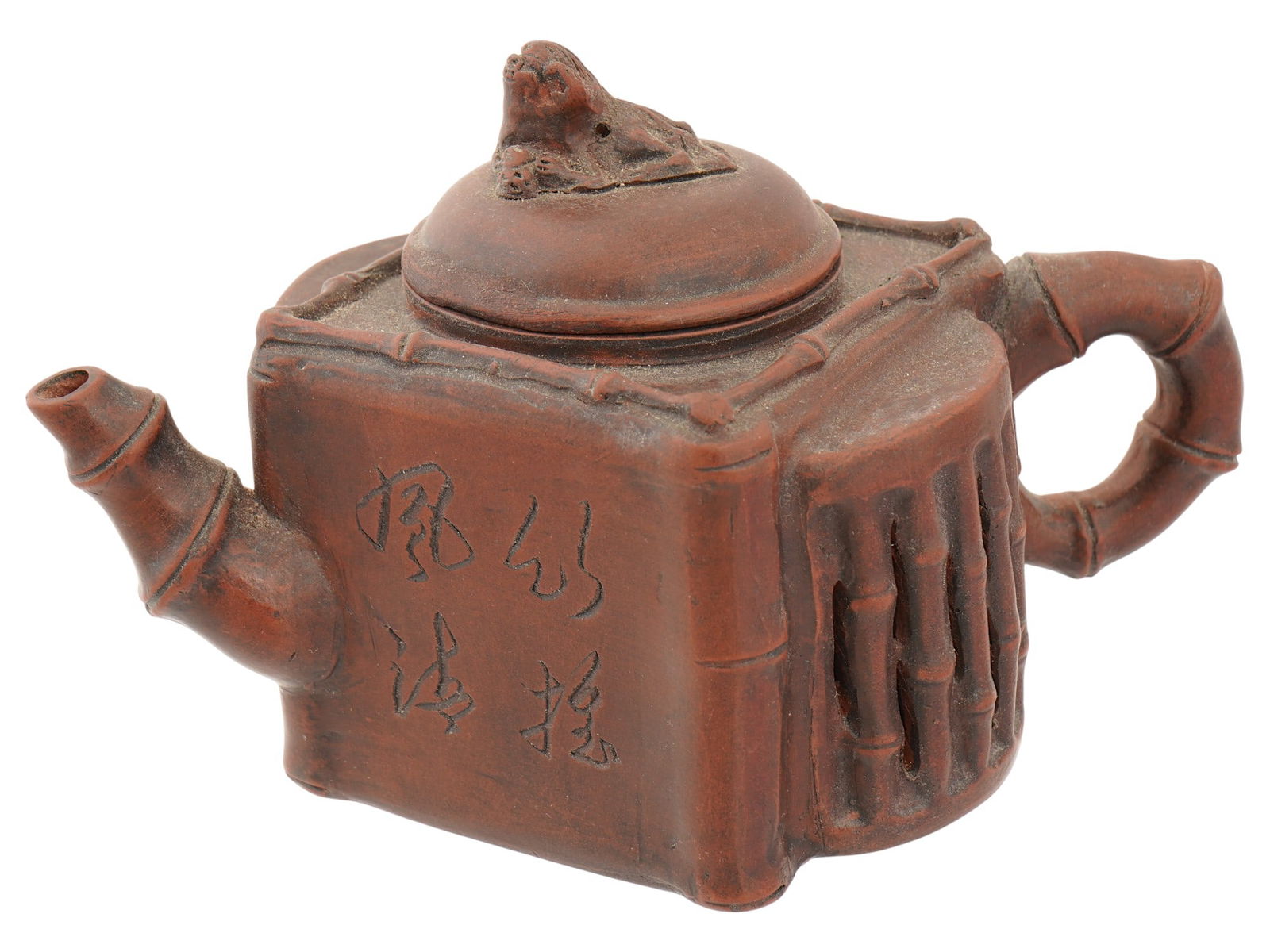 VINTAGE CHINESE YIXING ZISHA SQUARE BAMBOO CLAY TEAPOT: A vintage Chinese Yixing Zisha clay teapot, crafted from unglazed red clay sourced from the Yixing region and designed in a distinctive square bamboo-form. The four-lobed body, spout, and handle are m