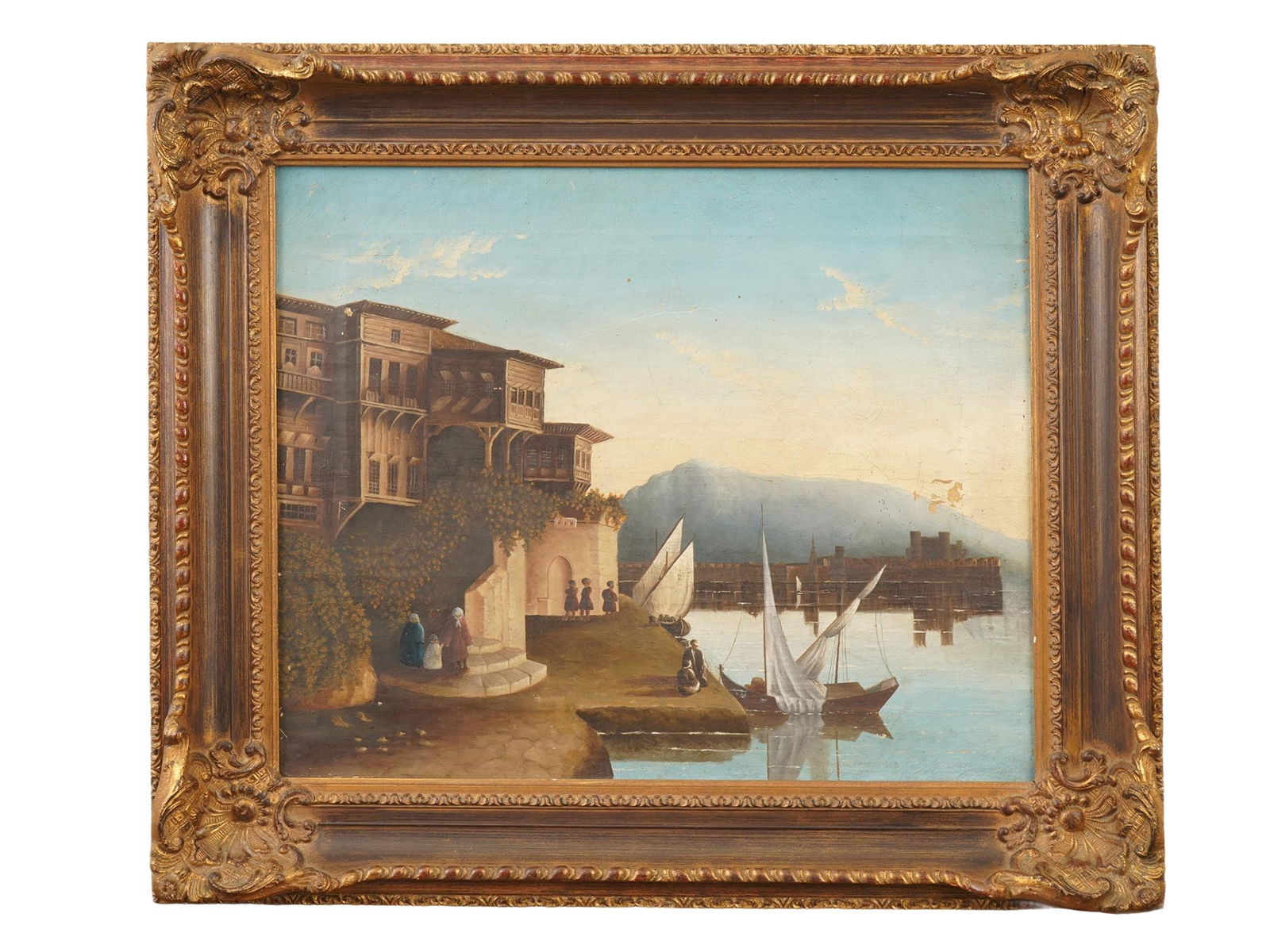ANTIQUE LANDSCAPE PAINTING BOSPHORUS HOUSES BY WATER: An antique oil landscape painting on canvas depicting houses by the water, portraying Ottoman-style country residences along the Bosphorus in the 19th century. Executed in an Orientalist manner, the c