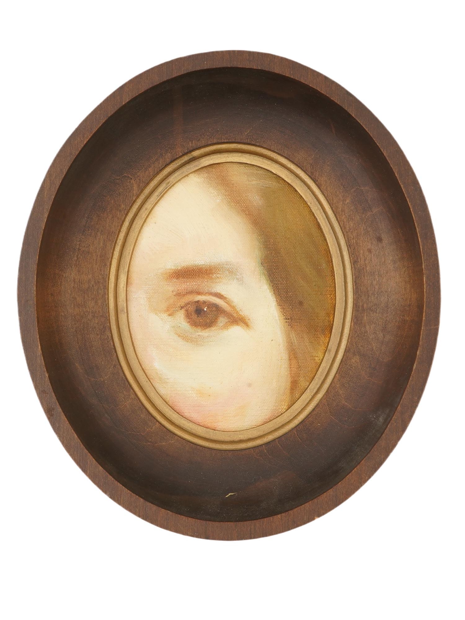 EUROPEAN LOVERS EYE OIL MINIATURE PAINTING FRAMED: A European School Lovers Eye oval shaped oil miniature painting on canvas mounted on board. These miniatures were used by couples in love to secretly exchange portraits when openly wearing a full leng