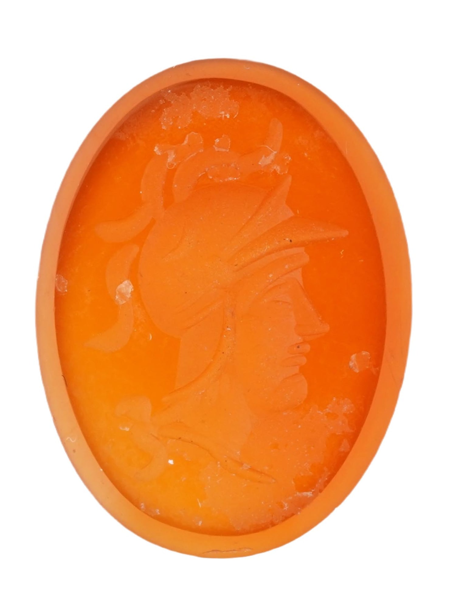 VICTORIAN MANNER HAND CARVED CARNELIAN STONE INTAGLIO: A Victorian manner hand carved Carnelian stone Intaglio depicting a profile portrait of a warrior. Oval in shape. The reverse side is flat. Antique and Vintage Roman and Victorian Jewelry Wares and Ac