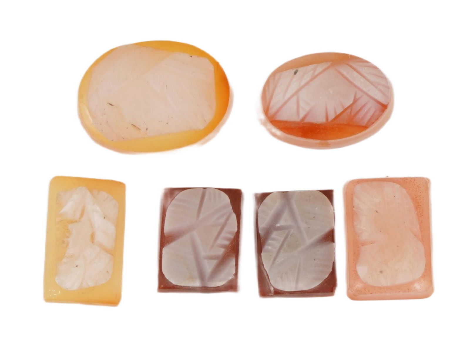 GROUP OF SIX HAND CARVED CARNELIAN CAMEOS: A group of six hand-carved carnelian cameos of oval and rectangular shapes. Depicting abstract images. Collectible Gemstone Carvings, Sculpture, Glyptic Art, Jewelry. THIS LOT IS ELIGIBLE FOR A