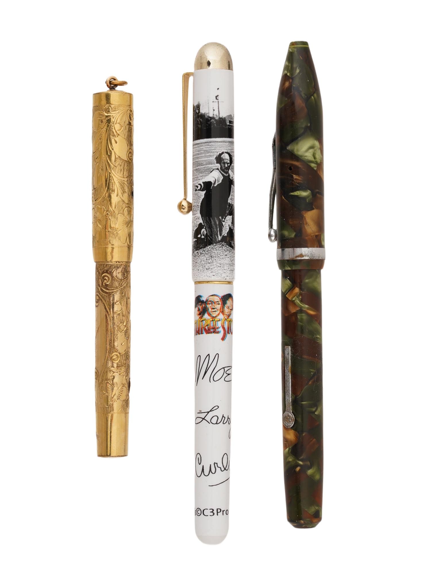 THREE PENS 14K WATERMAN STOOGES AND INKOGRAPH: A group of three pens, includes: 1. A Waterman Art Nouveau Safety Pen: 14K gold adorned with engraved floral pattern. Marked USA and 14K on a nib. 2. The Three Stooges Rollerball Pen. This is a modern