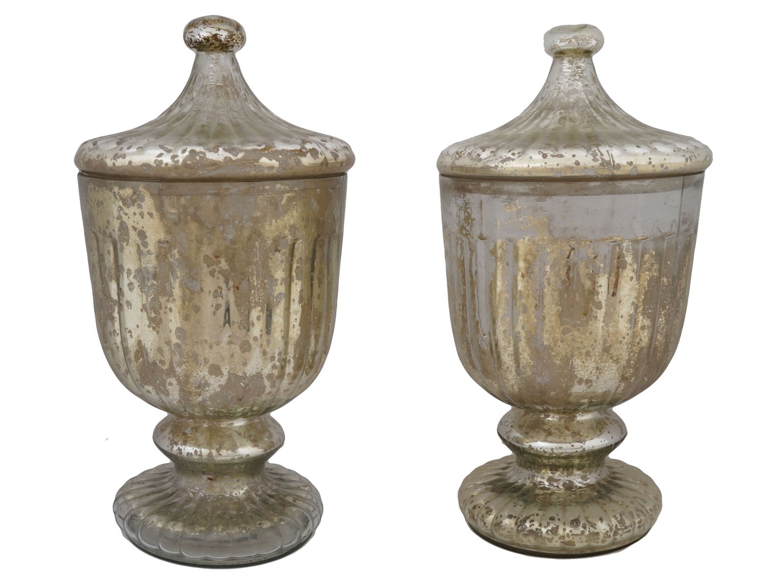 ANTIQUE MERCURY GLASS LIDDED URN VASES: A pair of antique large mercury glass lidded urns. Each has a fluted pedestal base, bulbous centers, fluted lids tapered to ball finials. Unmarked. Collectible Decor For Interior Design, Glassware.