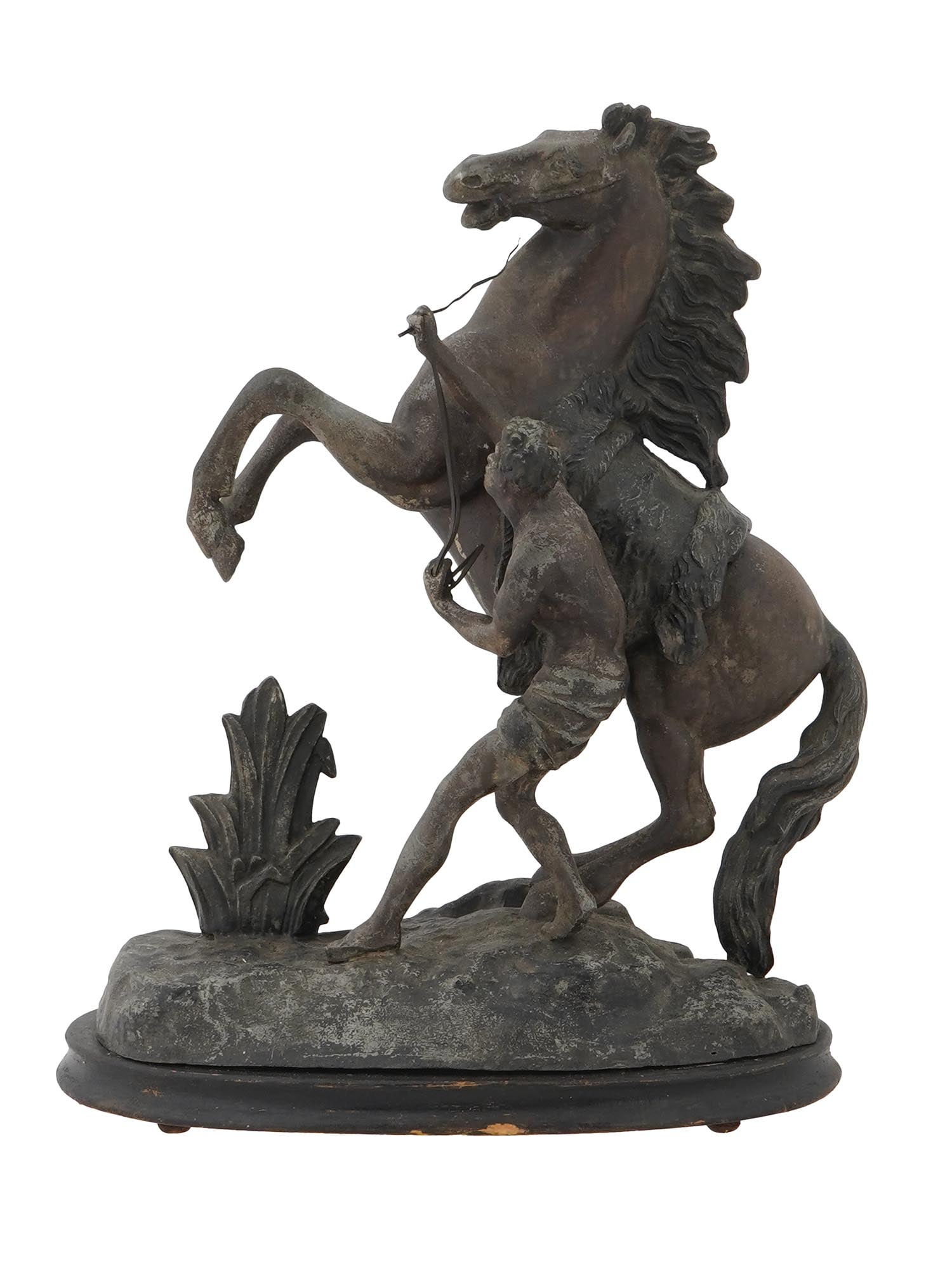 MARLY HORSE EQUESTRIAN SCULPTURE AFTER G COUSTOU: An antique French metal equestrian sculpture Cheval de Marly after the original marble artwork by Guillaume Coustou created in 1745. The artwork depicts a horse rearing up and being tamed by its drive