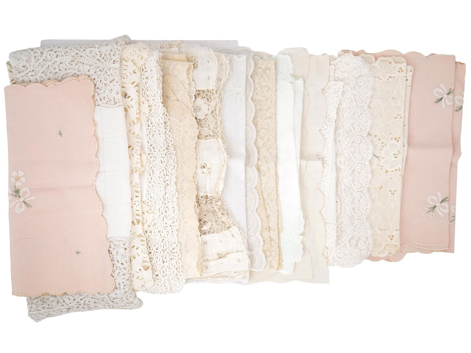COLLECTION OF 14 ANTIQUE ASSORTED TABLE RUNNERS: A collection of 14 antique table runners, displaying a variety of styles and materials, with a focus on lace, embroidery, and delicate fabrics in a range of neutral and pastel colors. The varied desig