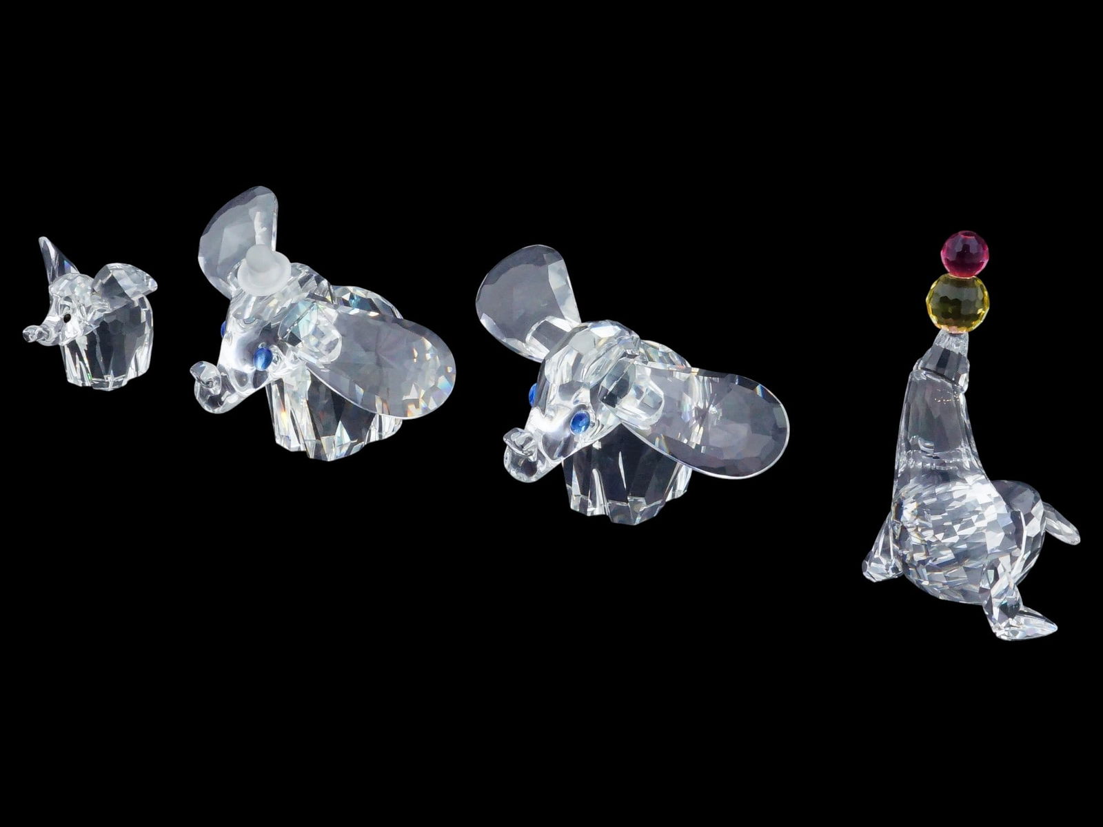 COLLECTION OF FOUR SWAROVSKI CRYSTAL FIGURINES (1 of 9)
