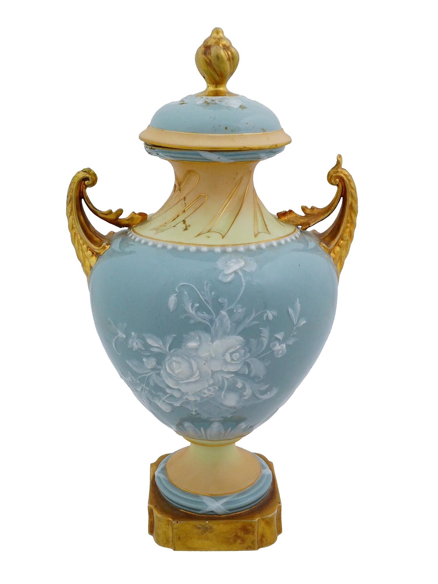 ANTIQUE AUSTRIAN ROBERT HANKE PORCELAIN PATE SUR PATE VASE: An antique Austrian porcelain vase features the delicate pate-sur-pate technique, characterized by building up translucent layers of white slip to create a raised floral relief. Pate-sur-pate, which a