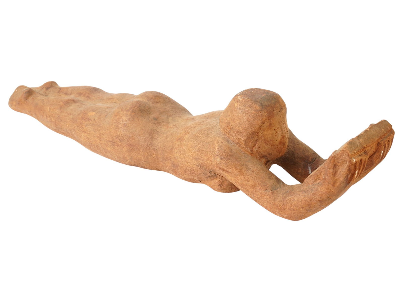 MODERNIST HAND CARVED WOOD FIGURINE OF NUDE WOMAN: A Modernist European School hand carved wood figure. The figure depicts a naked female figure in a prone position with arms extended forward. The elongated posture and streamlined composition suggest