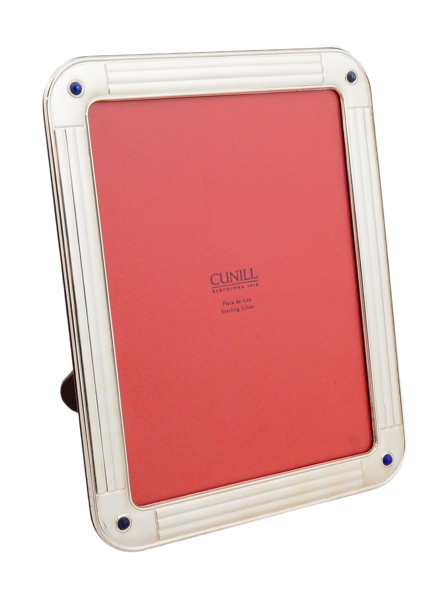 VINTAGE CUNILL BARCELONA STERLING SILVER PICTURE FRAME: A vintage Cunill Barcelona 1916 sterling silver picture frame, crafted in sterling silver with a refined polished finish and protective tarnish-resistant lacquer. The frame features a high-gloss