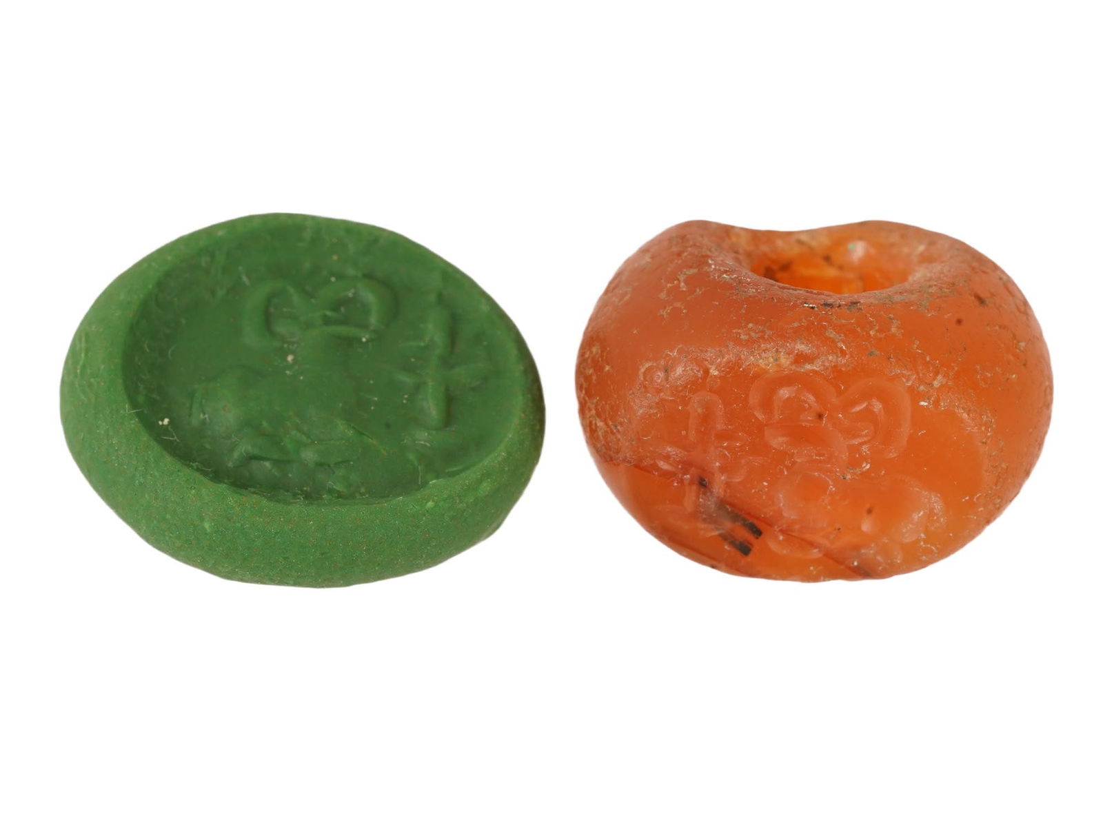 ANCIENT SASANIAN CARNELIAN STAMP SEAL W RAM 200 TO 600AD: An ancient Sasanian carnelian stamp seal bead with an engraved image of a ram. Pierced through the center. Circa 200 to 600 AC. Collectible Historical Artifacts, Archaeological Finds And Relics, and C